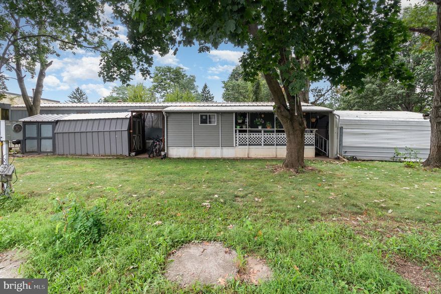 Enjoy the ease and convenience of one-level-living in this charming two-bedroom home in Shippensburg Mobile Estates! This home features a welcome and open living area with cathedral ceilings, a bright eat-in kitchen, two bedrooms, a spacious main bathroom, a convenient storage room, and so much more! The home features a newer roof installed in 2022, shed, a two-car carport, and a covered back porch perfect for relaxing and entertaining at home. Centrally located close to shops, dining, parks, route 11 and 81, and all of the amenities Shippensburg has to offer. Schedule your private tour today!