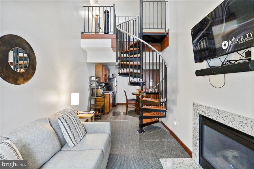 Seller will cover all 2026 HOA Dues at closing with an acceptable offer. Own your very own slice of peace and relaxation at Deep Creek Lake. The Suites at Silver Tree sits along 350 feet of private shoreline. The resort is a destination for many, and this unit  (one of the top rental units in the building) produces an annual revenue of $25k+. One of only four loft units that has a private bedroom at the resort, this opportunity does not come up often. This is the perfect condo for someone who wants to enjoy Deep Creek and bring in investment income as well. 

There is a superb on-site restaurant and bar, and professional on-site management, you will love the convenience of owning a suite within this community. This has been recently upgraded with new granite countertops throughout, granite fireplace surround, fresh paint, new furniture, carpet, and much more. The famous Dutch's at Silver Tree Restaurant and the accompanying Harbor Bar are feet away from your private unit and feature some of the best food and drinks at Deep Creek Lake! Silver Tree Marine is at your fingertips featuring boat, kayak, and SUP rentals. Take advantage of this established revenue earning vacation rental unit and start living the lake lifestyle today! Call now for more details or to see this property and the community in-person!