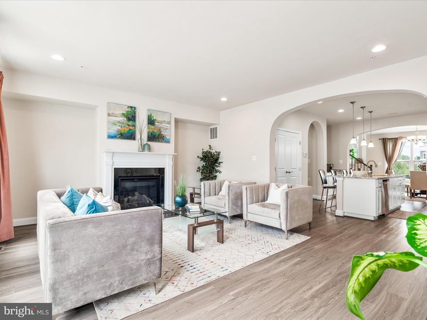 Welcome to Frederick living at its finest. Located just a mile from the vibrant heart of downtown Frederick, 822 Lindley Road offers the ultimate walkable lifestyle without sacrificing peace, parking, or privacy. Spend your evenings strolling along Carroll Creek or sampling downtown's celebrated dining scene, then retreat to a home that feels like a quiet sanctuary.  Spanning four beautifully finished levels and nearly 3,000 square feet of low-maintenance luxury, this 2019-built townhome is designed for both effortless entertaining and cozy daily living. The open floor plan has no shortage of natural light, anchored by a gourmet kitchen that flows seamlessly into the main living areas, and accented by architectural archways that add distinct character.  The outdoor spaces are a rare downtown luxury, featuring two private decks: a lower deck perfect for a quiet morning coffee, and a spectacular rooftop deck designed for sunset views and weekend hosting.  The Ultimate Parking Setup: A rare two-car rear-load garage plus two additional driveway spaces so you can say goodbye to downtown parking hassles.  Four Finished Levels: 3 Bedrooms, 3.5 Bathrooms, and a versatile bonus room with a fireplace.  Eastchurch Amenities: Enjoy zero yard work and full access to a community pool, clubhouse, playground, and neighborhood events (weekly food trucks, summer happy hours, block parties, and more!).  Financial Advantage: This home is eligible for the CHIP100 $0-down Community Homeownership Incentive Program!  If you’ve been searching for the space of a single-family home with the low-maintenance ease and location of a luxury townhome, your search ends here. Schedule your private tour today!