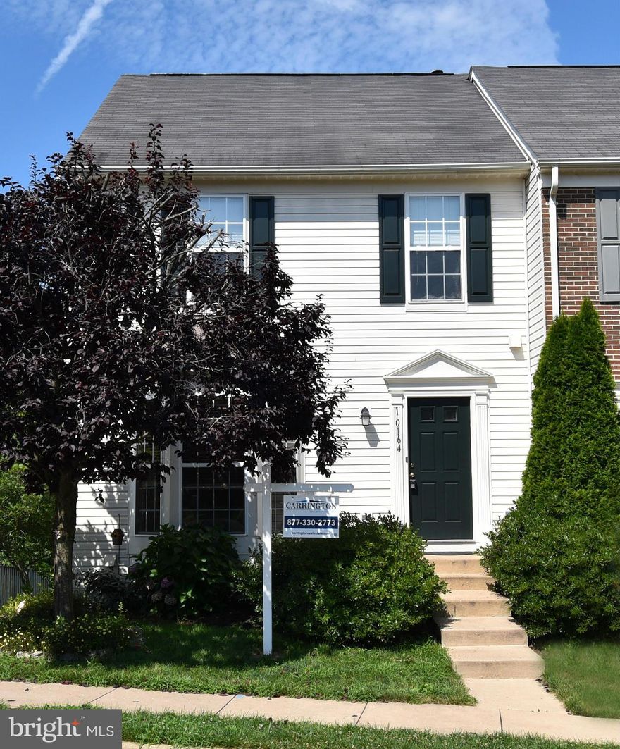 Beautiful end unit townhome in the Braemar community.  This 3 bedroom 3 finished level home backs to wooded common area and is in a private area of the neighborhood.  Large gourmet country kitchen with table space offers plenty of room.  Fully finished basement with stone surround fireplace and rear walk out and full bath.  Bonus room in the basement - Patriot High School district