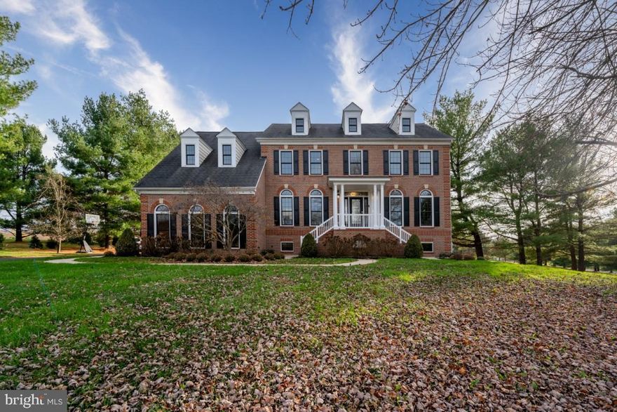 PROPERTY UNDER CONTRACT; SELLER ACCEPTING BACKUP OFFERS.  
Welcome to 11927 Meadow Vista Way, a stunning luxury single-family home nestled on a corner lot in Clarksville, MD. This magnificent residence boasts architectural grandeur with columns, crown moldings, and high ceilings, offering a total of 5768 square feet of living space.

Upon entering, you'll be greeted by panoramic views and an abundance of natural light streaming through the wall of oversized windows. The interior features a seamless blend of carpet and hardwood floors, creating an inviting ambiance throughout. The main level encompasses a formal dining room, a home office, and a library/den, perfect for both relaxation and productivity.

The heart of the home is the recently updated, spacious kitchen, complete with custom, imported appliances and a breakfast area. The family room features a cozy fireplace, ideal for gatherings and entertainment. On the second and third floors, you'll find five bedrooms, including a luxurious primary ensuite with a separate shower and a jetted tub, as well as walk-in closets and a double sink vanity.

The lower level is a fully finished space complete with an additional bedroom and kitchen. From here you walk out to almost 6 acres of your cleared and level private lot that offers a sense of seclusion and exclusivity. The perfect canvas for creating your dream property!

Don't miss the opportunity to own this exquisite home with a perfect blend of elegance and comfort. Schedule your private tour today and experience luxury living at its finest.