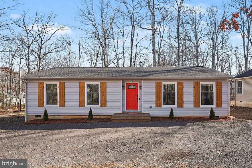 Welcome to 108 Seven Pines Drive —This one-level, 3-bedroom, 2-bath home offers 1,339 square feet of comfortable living on a .37-acre lot, and it’s been thoughtfully updated. Many of the big-ticket improvements are already done, including a new roof (2025), new hot water heater (2025), new attic insulation and wall insulation throughout, new LVP, brand-new kitchen appliances, plus a new washer and dryer. The bathrooms have also been refreshed with new vanities, giving the home an updated feel from top to bottom.
Step inside and you’ll immediately notice how the layout flows. The living room opens into the kitchen — a welcoming hub of the home with new cabinetry and built-in shelving/bench seating that adds personality and function. A sliding glass door leads straight to the backyard, making indoor-outdoor living easy.
Down the hall, all three bedrooms and both bathrooms are conveniently located. One secondary bedroom with painted wood-paneled walls is perfect for a nursery, office, or guest space. The other non-primary bedroom includes two closets. These rooms share a full hall bath with a tub/shower combo. The primary suite is its own retreat, recently painted and paired with an attached bath featuring dual vanities and a shower.
Outside, you’ll appreciate the circular gravel driveway, mature trees, and sweet garden beds that add a little extra charm. Out back is where you’ll really want to hang out: a newly repainted 8x16 deck, recently finished with lattice trim, creates a great spot for grilling, relaxing, or entertaining. 
And of course, living in Lake of the Woods is a lifestyle all its own — with an award-winning 18-hole golf course, pools, lakes and marinas, clubhouse, fitness center, pickleball and tennis courts, campground, equestrian space, and more. When you need to head out, Route 3 shopping, dining, and groceries are close by, and you’re within easy reach of Fredericksburg, Orange, and Culpeper.
If you’re looking for a move-in-ready home with major updates already completed — in a community that truly feels like a getaway — 108 Seven Pines Drive is a must-see. Schedule your showing today.