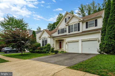 Photo of 13040 Pilgrims Inn Drive, WOODBRIDGE, VA 22193 (MLS # VAPW2124702)