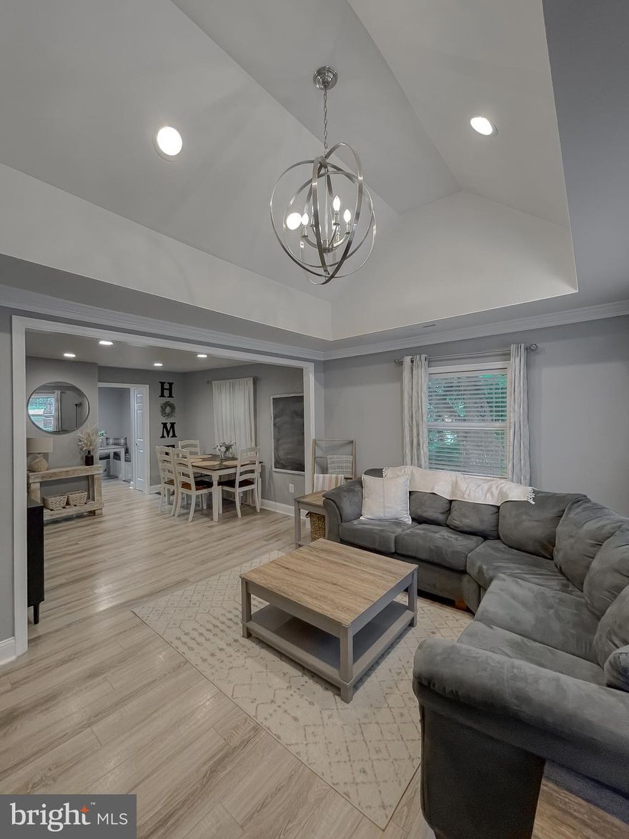 You HAVE to check out this 1948 rambler that was fully renovated in 2020 and has been turning heads ever since. Sitting pretty on half an acre lot with seasonal water views, this rambler is LARGER than it looks and packed with updates that matter: new septic in 2020, roof and HVAC both under 10 years young. Step inside to updated finishes and a gorgeous tiled shower in the primary suite. The bedrooms are spacious, the vibes are cozy, and everything feels fresh without losing that original charm. Outside, enjoy morning coffee on the front porch and evening hangs on the back deck . Turn key, tucked-in, and totally ready for you!