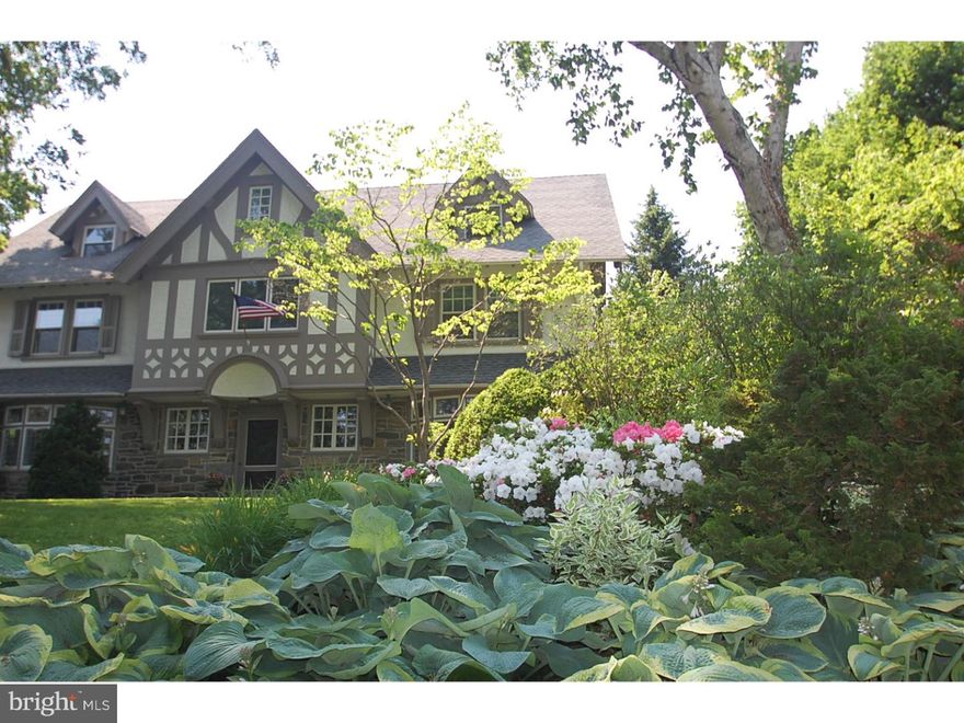 Elegance and charm abound in this turn of the century Tudor style colonial. This very special 5 Bedroom, 3 full and 2 partial Bath homes invites comfortable family living on 3 cheerful, beautiful stories. This classic home was built in 1905 and shares the beauty of old world charm with the convenience of modern amenities and upgrades.  Step into the sunlit foyer and allow yourself to observe the extensive millwork and hardwood floors throughout the open First Floor. Enjoy casual gatherings or formal entertaining in the Living Room with French Doors to a covered Porch, a grand stone fireplace and large leaded glass windows  contribute to the ambiance of the home. The Dining Room with matching leaded glass windows is a perfect setting for the meals you'll love preparing in the renovated Kitchen with granite counters, radiant heated tile floor, breakfast bar and gourmet stainless steel appliances including gas cooking, double ovens and sub-zero refrigerator. There is a Butler's Pantry/Mudroom with an additional sink, icemaker and storage. Completing the main level is a Den with a brick fireplace and built-in bookshelves. It is the perfect space for a TV Room, office or just curling up with a good book. The Main Floor has a beautiful marble Powder Room. SECOND FLOOR: The Master Suite welcomes you with an impressively detailed entrance hall with closet and new marble Master Bath including double vanity, stall shower and soaking tub. The exquisitely updated Master Bedroom has a large custom fitted walk-in closet and a separate shelved closet. In addition there is an upstairs Sitting Room. There are 2 additional Bedrooms and an updated Hall Bath. Perched on the third floor you will find an additional 2 Bedrooms, an Office and an updated Hall Bath with stall shower. Elegant refinished hardwood floors flow throughout most rooms of the home and a full basement provides another gathering space as well as ample room for storage. The back yard is a wonderful setting for relaxing or outdoor recreation with an in ground pool,covered porch and underground sprinkler system. The desirable central location in the historic district of Ardmore affords you award winning Lower Merion School District and easy access to public transportation and Amtrak direct to New York. Walk to Suburban Square and all the amenities it has to offer. This home is a Main Line Gem! ** C/A on 2nd and 3rd Floor