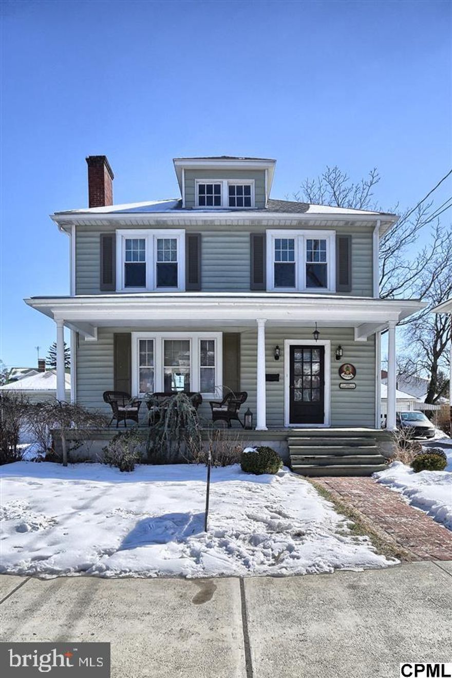 Roomy, comfy, and move in condition! Borough traditional boasting high ceilings, oak and pine hardwoods and smart updates throughout. Gas logs in LR, island in kit, open stairway,screened in porch off MBR. Walk up attic, original door hardware, built-ins, mail at the door, 8? baseboards. Fenced lush backyard, covered front and back porches. Recent updates ? gas boiler, roof, gutters/downspouts, front sidewalk, many windows.