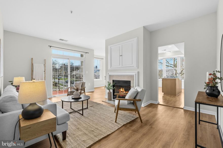 Welcome to this beautifully updated 2-bedroom, 2-bath corner condo in the highly sought-after King Farm community. Located in a secure elevator building, this sun-filled second-floor home offers the perfect blend of comfort, style, and convenience. Step inside to discover abundant natural light from multiple exposures, enhanced by a spacious layout that includes a separate dining room with windows on two sides—a rare and inviting feature. The kitchen flows into an additional cozy family room/living space, ideal for both everyday living and entertaining. The primary suite features a walk-in closet and private ensuite bath, while the second bedroom and full bath offer flexibility for guests, a home office, or both. Enjoy your morning coffee or unwind in the evening on the private balcony just off the living room. In-unit washer and dryer. Recent updates include new luxury vinyl plank flooring, fresh paint throughout, quartz countertops, stainless steel appliances, and updated light fixtures. Ideally located with access to community pools, clubhouse, fitness center, and shuttle service, as well as nearby King Farm Park and Mattie J. T. Stepanek Park. Walk to King Farm Village Center for shopping, dining, and groceries, with easy access to I-270 and ICC for commuting. Don’t miss this fantastic opportunity to live in one of Rockville’s most sought-after communities. Pet-friendly.