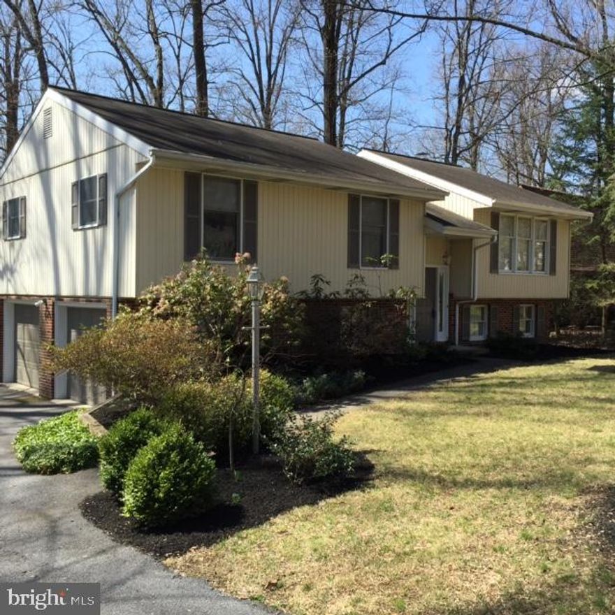 1,932 Total sq ft, Immaculately maintained and remodeled top to bottom home. Beautiful custom kitchen w-quartz counters & stainless steel appliances. Gorgeous wooded setting. Family room has cozy fireplace. This is a must see home!