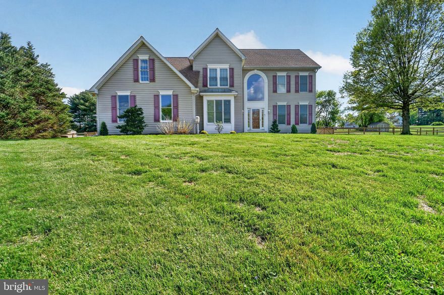 Located in sought-after Village Green Estates, 1691 Village Green Drive sits on a private 2-acre lot with over 2,700 sq ft of living space. This move-in ready home features fresh paint, brand-new carpet, and a spacious layout including a bright living room, formal dining room, and a kitchen that opens to a cozy family room with fireplace. Upstairs offers a primary suite with walk-in closet and private bath, plus three additional bedrooms and a full hall bath. Recent updates include a 3-year-old roof, new HVAC (2025), fully fenced yard (2024), pellet stove (2024), and ceiling fans in all bedrooms.  Additional highlights include a 2-car side-load garage, huge shed, and a large backyard perfect for outdoor living. Peaceful setting just minutes from schools, shopping, and dining.