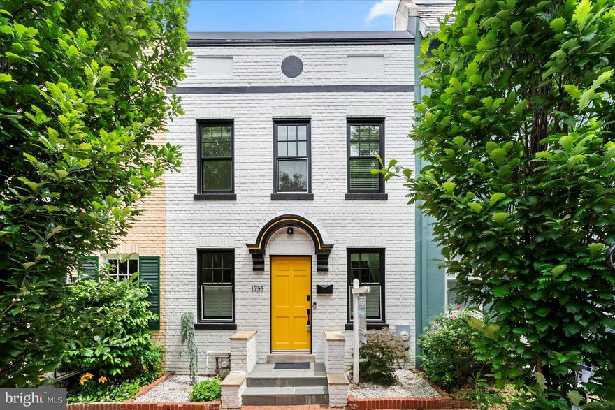 Classic Georgetown row home with modern finishes and updates throughout.  Main level offers an open concept with a recently remodeled kitchen featuring stainless steel appliances and quartz countertops.  Light hardwood flooring and ample windows create a light airy feel.  Custom built-ins offer a level of functional storage and beautiful design aesthetic.  French doors offer access to your private courtyard perfect for entertaining or relaxing.  Upstairs there are 2 generously sized bedrooms with large closets and an updated luxury bath.  Multiple skylights provide natural light to both the hall and bathroom.  The basement offers a tremendous amount of flexibility and can be used as a third bedroom, guest space, family room or whatever you need.  HUGE walk-in closet and another full bath.  The basement has a walkout to the backyard.  34th St NW is a one-way street and offers ample street parking right in front of the home.