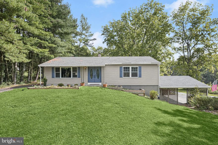 Welcome to 3924 Garfield, where an incredible property awaits you. Situated on a fantastic lot with an amazing barn, located in the desirable Middletown Schools district, this home offers a unique blend of country living without the constraints of HOA regulations or city taxes.

**Made from American Chestnut the phenomenal bank barn offers a versatile space that could be used for a growing business,  the space can accommodate large equipment and has electric to the building, the possibilities are endless.

As you step onto this picturesque property, you'll immediately be captivated by the charm and possibilities it presents. The fabulous rancher design boasts an open concept floor plan that invites you to explore all that this home has to offer.
The living room is a welcoming space, featuring stunning Brazilian cherry hardwood floors that flow seamlessly into the kitchen. This space is designed for easy living and entertaining. The kitchen is well-appointed with ample cabinetry, a decorative backsplash, and a casual dining area. From here, you have direct access to the deck, making it the perfect spot to enjoy your morning coffee or host outdoor gatherings with friends and family. The primary bedroom is a retreat in itself, adorned with a spacious walk-in closet and an en-suite full bath. It's a private oasis where you can unwind and relax after a long day. Two additional bedrooms and another full bath complete the main level, providing comfortable accommodations for all members of the household. Venture downstairs to the lower level, where you'll find a versatile recreation room that can serve as a game room, home theater, or a space for various activities. The laundry room adds convenience to your daily routines, and there's also a bonus room that can be used as a home office, gym, or craft room. You'll appreciate the convenience of direct garage access, making it easy to come and go. Outside, the property offers even more to love. A wrap-around driveway provides ample parking space for you and your guests. The 2-car attached garage offers secure storage for your vehicles. Additionally, there's expansive covered parking, perfect for protecting your outdoor equipment or hosting gatherings. And let's not forget the impressive bank barn, made from American Chestnut complete with electrical service, which opens up a world of possibilities for storage, hobbies, or even a workshop. Updates include, roof, bathrooms, gutters, Pella windows, siding, and more.

Surrounded by Parks that include, Cunningham Falls State Park, Catoctin Mountain Park, Wolfsville Ruritan Community Park, South Mountain State Park, Black Rock Vista, and so much more!