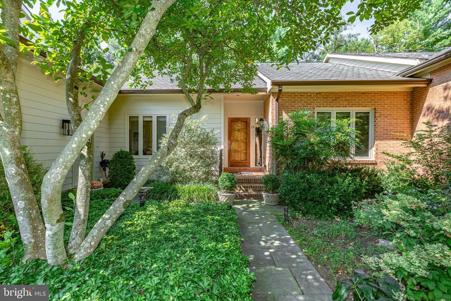 This beautifully landscaped home is nestled in a quiet and sought-after community, perfect for those who enjoy outdoor living. The property features a charming brick  patio for entertaining,  surrounded by serene open space. Inside, the formal dining room opens up to a large living room with a cozy gas fireplace and doors leading directly to the patio.

The fully equipped kitchen is a chef's dream, complete with granite countertops, an island breakfast bar, two ovens, and a large window that floods the space with natural light. Ample storage is provided by two large pantries.

The home boasts three bedrooms, with one currently set up as a home office, complete with extensive built-ins. Updated  bathroom offers a separate tub/shower,  The master bath has  a walk-in shower. Hardwood floors flow throughout the home, adding warmth and elegance.

Additional features include a two-car garage, making this home a blend of comfort and convenience. HOA includes exterior painting.