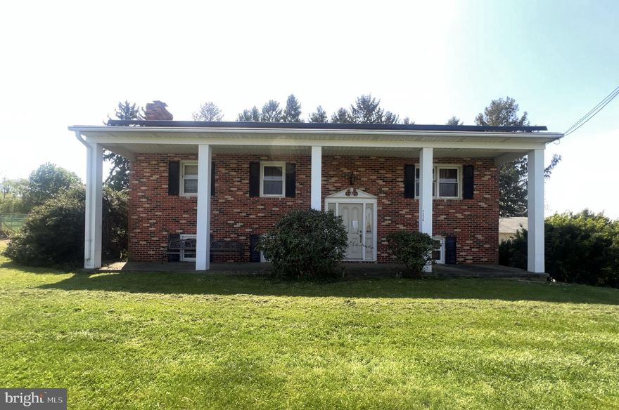 What an incredible price for this single-family home! Another great listing in Woodbine! This home has 3 spacious bedrooms and 2 full baths on the top level and 4 additional rooms on the lower level that can easily be converted into bedrooms as you wish! The upper bedrooms have hardwood flooring and a spacious kitchen. Exit door to rear yard right from the kitchen. Laundry is on the lower level.  Space galore on the lower level makes this home a great buy. Almost a half-acre lot for you. Two front-loading oversized detached garages and a parking lot/driveway enough to fit 4-6 cars. The basement is partially finished with room for an additional bedroom if desired, an office, a home gym, a library, or another recreational room. The list of opportunities goes on. This home is very spacious, and you will be amazed at the space once you enter this home. Come make this home your private design center to your liking. The home is fully available to show anytime. Call the listing agent with any questions you may have. Happy tour or Happy Showing!