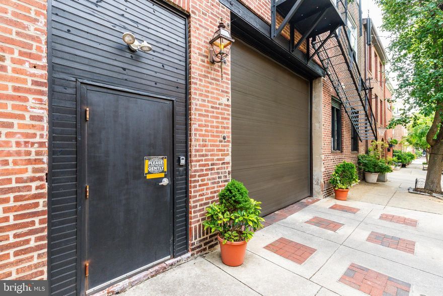 Introducing "Bainbridge Lofts" at 710-16 South American Street: a turnkey, stabilized loft
apartment building located in the coveted Queen Village submarket of Philadelphia,
Pennsylvania. With 13 units and 30 parking spaces in a private, secure garage, Bainbridge
Lofts provides residents with the ultimate urban lifestyle rooted in convenience and character.
With exposed brick and beam throughout the property, tenants feel instantly at home, tucked
away on a quiet, extremely well-maintained street (the property runs from South 3rd Street to
American Street) in a location that's walkable to many of the city's top restaurants, cafes,
parks and shops. Hardwood floors, stainless steel appliances, quartz countertops, spiral
staircases, shaker cabinetry and exposed ductwork lend additional interior appeal, while the
redbrick facade provides immediate curb appeal. Assumable financing is in place (subject to
lender approval) with a highly-attractive 4.85% interest rate through November 1st 2027, with
a 5-year extension option available through 2032. Generational blue-chip multifamily assets
such as Bainbridge Lofts rarely come to market due to limited supply in the residential
neighborhoods they inhabit. Tangible rental upside exists for new ownership to raise rents via
cosmetic enhancements if desired. This could be done on an unobtrusive basis (unit by unit
rather than full building) so as to not disturb the existing tenant base. Located just outside of
the urban core in a tranquil setting with convenient connections to all of Philly's main arteries
and roadways, Bainbridge Lofts is positioned for sustainable demand for decades to come. Buyer responsible to verify taxes, SF and financials in DD. 48hr notice to tour (tenant occupied).