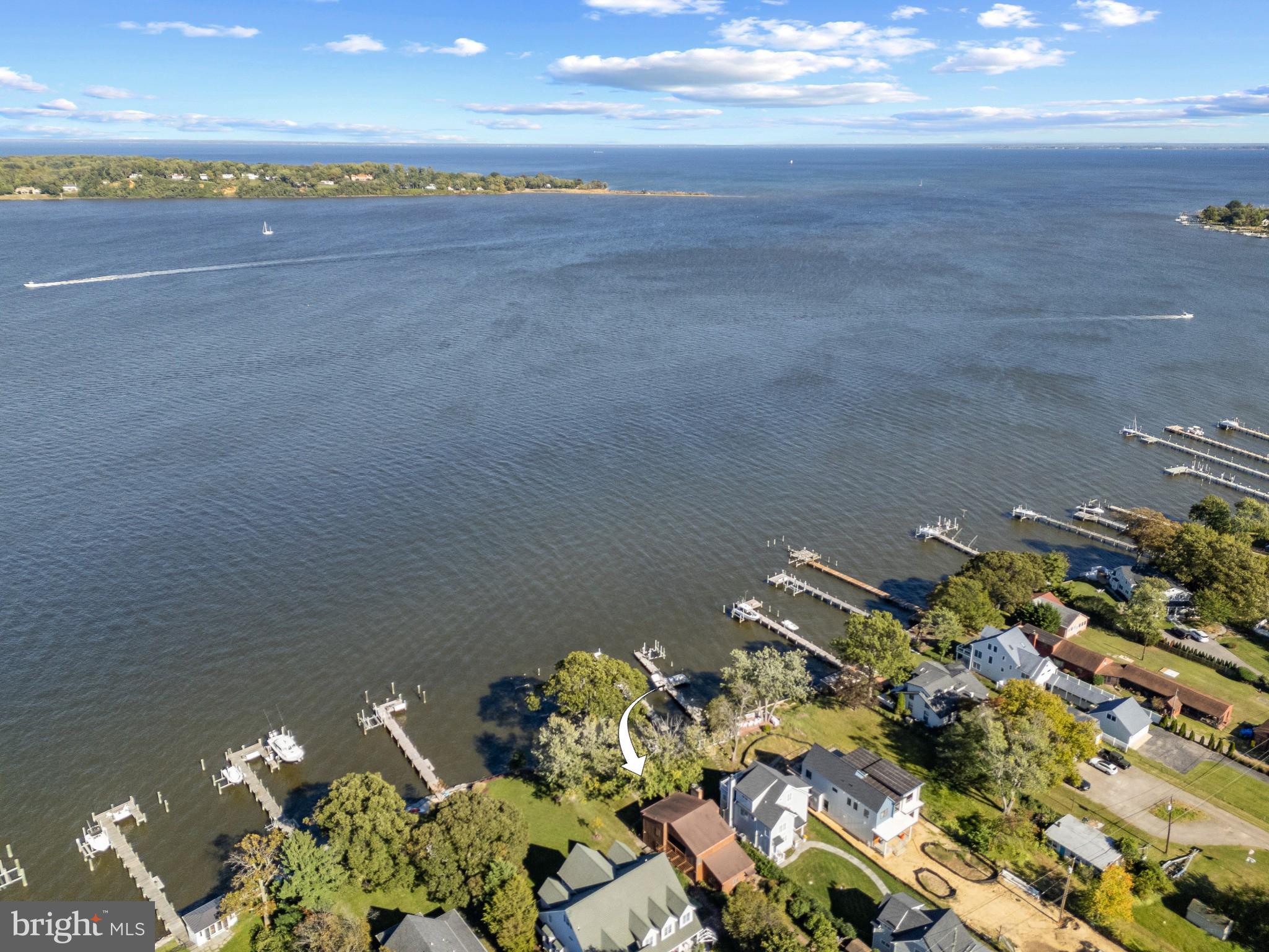 Great opportunity for a waterfront home on the shores of the Magothy River, perfectly located at the mouth of the river and sited at the best elevation to take in the views. Embrace the waterfront lifestyle and enjoy the panoramic views of the Magothy River, Gibson Island and the Chesapeake Bay from inside and outside of the home. This classic cedar waterfront get away sits on a flat .61 acre lot surrounded by newly developed high-end homes in the serene Shore Acres community This 3 bedroom, 3 full bath home features hardwood floors, 2 wood burning fireplaces, generously sized rooms, and convenient main level in-law suite with full bath. This charming home is ready to move in as is or provides the perfect chance to customize every detail to your liking. Bring your imagination and your architect! Setback off the road and sited to take advantage of the captivating views, the options are endless for creating a spectacular weekend escape or full time residence. The upper level boasts a spacious Primary bedroom with private balcony, ensuite bath, fireplace and the best views in the house. An additional ensuite bedroom with views from the balcony completes the upper level of this fabulous home. The Shore Acres community beach, picnic area and boat ramp are just one block away, and the property is located in the highly coveted Broadneck school district. It’s the perfect location to quickly access downtown Annapolis for shopping and dining or jump on Rt. 50 to get back to Washington, DC. If you’re looking for a fabulous setting in a great neighborhood come take a look!
