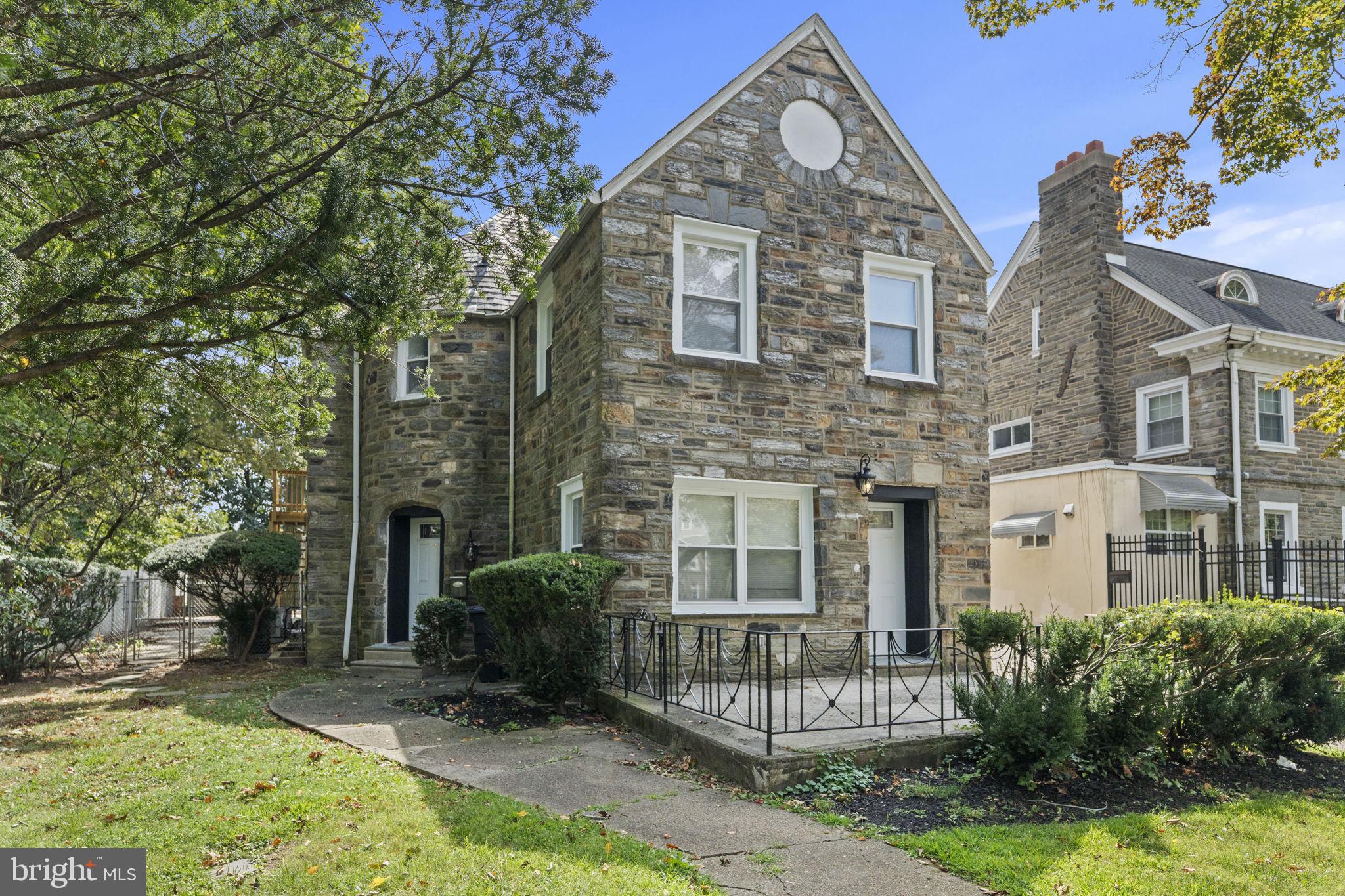 Welcome Home to this newly renovated gem on a quiet tree lined street in Wynnefield- where timeless architecture and modern living converge. Conveniently located between Center City and the Main Line, this beautifully restored 4-bedroom, 3.5-bath single family home offers the perfect blend of historic charm and contemporary sophistication. As you enter the home you'll immediately feel the openness of the reimagined floor plan. The living room, which boast an abundance of natural lighting, offers a warm gathering space perfect for a family movie night. At the heart of the home is the sunlit kitchen which is both elegant and functional—featuring a large island, custom blue cabinetry with gold accents, quartz countertops and stainless steel appliances. Whether you’re hosting a dinner party or enjoying a casual evening at home, the layout makes entertaining effortless. A spacious dining room area allows for grand family and holiday dinners. Right off the dining area, is a conveniently positioned bonus room that can be used as a home office, den area, home gym or anything else your heart desires. This bonus room extends to an out door private patio—the perfect space for morning coffee, or to just get some peace and quiet. This floor also features a conveniently located powder room. Upstairs, the second floor showcases three inviting ample sized bedrooms, including the master suite. This space features vaulted ceilings, a walk in closet and a spa-like en suite bath featuring a soaking tub, a separate shower, his and hers vanity and designer finishes- rounding out the perfect oasis. The hall bath is equally refined with designer finishes and ample space. A secondary bedrooms opens up onto a large private deck that overlooks the rear patio below. The third floor offers a private retreat with a fourth bedroom, full bath, and additional storage—ideal for guests or extended family. The lower level expands the living space which can be used as a flexible area such as a playroom for the kids or a man cave. Every detail of this home has been thoughtfully restored and updated, creating a perfect balance of historic elegance and modern comfort. From sunlit mornings on the patio to lively evenings of entertaining, this home offers a lifestyle of warmth, luxury, and convenience—all in the heart of one of Philadelphia’s most desirable neighborhoods. Schedule you showing today!