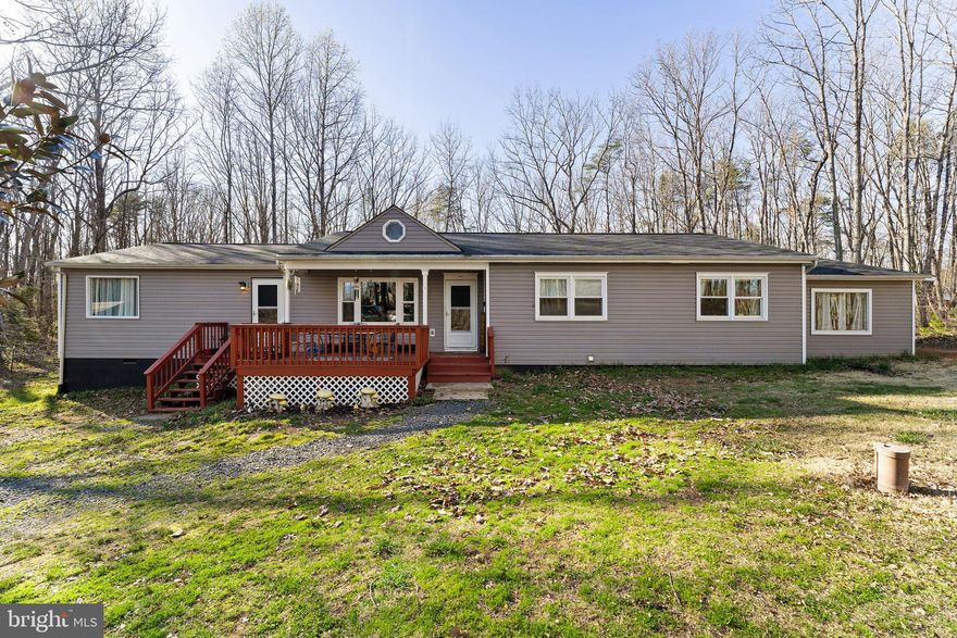 Come right in and see the space this home has to offer! This Rambler on 2.33 acres offers an inviting Front Porch, cozy Living Room, Eat-in-Dining/Kitchen, Full Laundry Room with lots of natural light, 4 Bedrooms, 2 Full Baths, Hall Laundry Room w/ an addition washer/dryer hook up and a cozy Deck off the Master. But the most unique part of this home is the In-Law Suite. This suite offers a Kitchenette, Living Room, full Bath and Bedroom with a private entrance. There are so many opportunities with this home that you don't want to waste another second, come make your appointment today! Home sold "AS-IS".