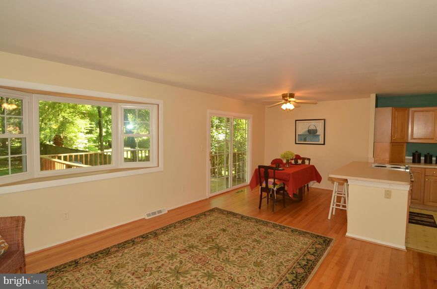 **Sought After Sunrise Beach! Water Priv! Home Offers Open Floor Plan! Wood Floors!  Bay Window, French Sliders To Deck! Kitchen Offers Large Peninsula Area! Plenty Of Cabinet N Counter Space! Low Level Rec/Fam Rm W/ Stagger Stoned Fireplace N Bench Area! 4th Bedroom/Den! Full Ba N Vanity Area! Sep. Laundry Rm. Huge Landscaped Rear Yd. *Tiered Deck, New Stone Patio.