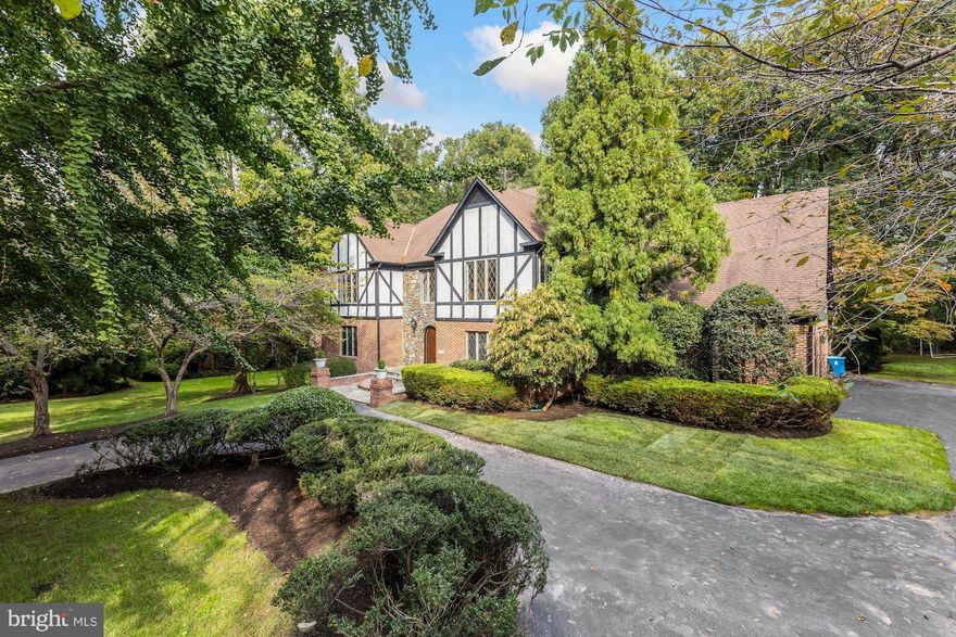 Welcome to 895 Linganore Drive! This captivating Tudor style home enjoys an enviable position situated on almost one acre on a quiet Mclean cul-de-sac, nestled between 400 forested acres in adjacent Scott Run Nature Preserve (for your morning and evening walks) and an unbeatable location of 495, 66 and GW Parkway convenience . Ensuring a life of peace, privacy, nature and prestige with its exquisite design, this 5,200+ sf of above grade living space is completely remastered with sophistication, beautifully updated and thoughtfully designed to offer all the conveniences for today living. Featuring 5 large bedrooms with all newly renovated 5.5 Bathrooms, this home is a must see as its owners invested over $400,000 in renovations and upgrades. With two large home offices, there is space to work or school from home.  The beautiful entry with an exquisite chandelier opens to the formal living room and a spacious  sunken family room with high-vaulted ceiling, distinguished paneled walls and a beautiful wood burning fireplace (one of five fireplaces). A perfect home for formal entertaining, the dining room with chandelier lighting flows seamlessly into the gourmet dream kitchen.  This state-of-the-art kitchen is fully rebuilt with custom cabinets, Gaggenau appliances, double freezers, an Italian Superior Tecnogas deco series gas range with 6 brass burners, griddle and two ovens, lovely crystal chandeliers, Farmhouse Apron-Front sink and Waterstone faucets including a wheel pulldown faucet in polished brass. There is an expansive island with leathered Abrolios green granite, perfect for morning family interactions enjoying cappuccinos from your built-in gourmet Miele coffee machine or to sip cocktails from the beverage center and Scotsman icemaker. The kitchen flows to the dining room, family room, a large multipurpose party room for entertaining, and out to the patio with heated pool and spa. Upstairs, the Master suite boasts its own lavish spa-like bathroom with freestanding Victoria and Albert Tub, separate double rain showers, double sink vanity, heated and waterproofed floors, mood lighting, Bluetooth bath fan & speaker, and Toto automatic toilet seat bidet. There are two additional en-suite bathrooms to accompany three generously sized bedrooms upstairs with one leading to a balcony overlooking the pool and woods. The newly refurbished walkout lower level has a newly installed window in a large bedroom with fireplace, new bathroom and huge double-sided rec room with fireplace. This home has piped gas for the Infinity gas hybrid heating and cooling unit and the gas heater for the swimming pool. There is a two-car garage with brand new garage doors. The landscaping has an irrigation system, Located seconds from 495 and Georgetown Pike in the prestigious Langley High School district, just a few minutes to Tysons Corner shopping and dining, Downtown McLean, and 15 mins to DC, Arlington and Bethesda. No Beltway noise inside home notwithstanding close proximity to beltway.  This is McLean living at its finest. Welcome home!  Open House Cancelled.  Under Contract.  Sellers will accept backup offers.