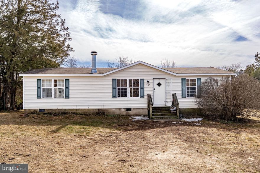 This charming 3-bedroom, 2-bath ranch-style home sits on a beautiful 1.23-acre lot, offering the perfect blend of space, privacy, and peaceful country living. With no HOA, you’ll have the freedom to truly make this property your own. Step inside to find new flooring throughout, creating a fresh, modern feel from the moment you walk in. The single-level layout provides easy, comfortable living with a functional flow that suits both everyday life and entertaining. The spacious primary suite offers a private bath, while the additional bedrooms provide flexibility for guests, a home office, or hobbies. Outside, there’s plenty of room to garden, play, relax, or simply enjoy the open space and fresh country air. Whether you’re looking for your first home, downsizing, or searching for a quiet retreat, this property is vacant and move-in ready, just waiting for its new owners to make it their own.