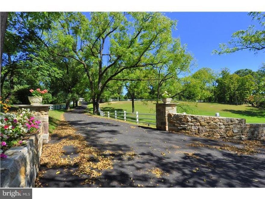 "Strawberry Hollow Farm" a quintessential Chester County 10 acre property w/a stone farmhouse circa 1833, blended w/a modern day addition, and a completely restored barn that offers additional entertaining space w/magnificent views, ample room for two horse stalls & a workshop. The grounds are breathtaking & boast beautiful English gardens, fenced paddocks, a pond, springhouse & orchard. This home offers a long driveway w/Belgium block & stone wall entrance. The interior floor plan has been extended over the years & flows extremely well maximizing living space while keeping the charm & character of the original historic rooms intact. The addition includes a Kitchen & fireside Great Room w/a wall of windows, two sets of French doors to one of several decks as well as a Master Bedroom Suite w/post & beam construction, cathedral ceiling & lavish Master Bath w/a wall of windows & doors accessing a private deck. The original parts include a cozy fireside Den w/wet bar, a fireside LR & a Library that could be a 5th bedroom suite, complete w/a private deck. This home combines Old World charm w/ all of today's modern amenities, offering beautiful scenery & exceptional living/entertaining space. Must see this stunning and unique property.