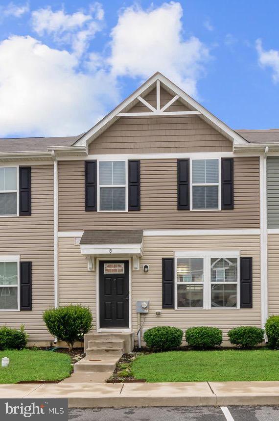 Welcome to your next home sweet home! This spacious 3-bedroom, 2.5-bath townhome combines comfort, convenience, and charm—all just minutes from the University of Delaware and tax-free shopping, I-95, and local gas and convenience stores. Step inside to discover a bright and inviting layout, with main floor powder room. This home offers window treatments and wall-mounted televisions included in your purchase. Upstairs, the second-floor laundry adds everyday ease, while three bedrooms provide individual space. The owner's bedroom has a walk-in closet. The main floor flows effortlessly into a generous backyard—perfect for entertaining or just enjoying a little peace and quiet. Lawn cutting is included, and you'll also appreciate assigned parking, so you’ll never have to hunt for a spot. Whether you're a first-time buyer, an investor, or someone looking to simplify their lifestyle, this townhome checks all the boxes.