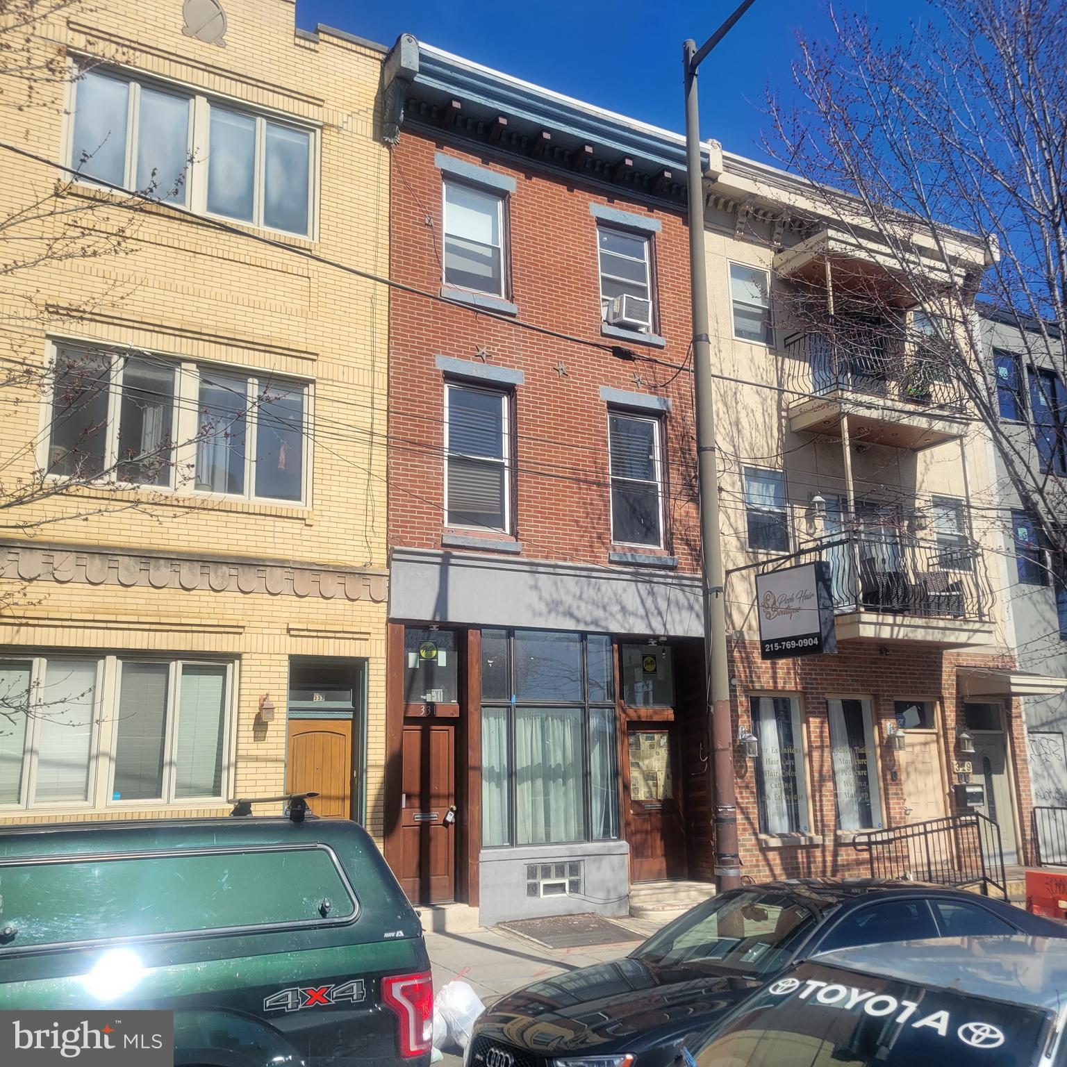 5.125% Owner financing and Lease Purchase options available. FHA 1st time home Buyer's are eligible to purchase. This is a well maintained Triplex with by-right 1st floor Commercial potential located along the prime Northern Liberties stretch of Girard Avenue. Over 1000 brand new construction units permitted and under construction within 1 block. Steps from the bustling and trendy 2nd Street Restaurant and shopping district. 1 block from Acme Grocery and 2 blocks from the very popular Market/Frankford El which delivers passengers to City Hall in just 8 minutes. Large one bedroom/office space on first floor with rear yard access, currently rented for $1250 with Tenant ready to renew or vacate, projected rent of $1500. Large well appointed one bedroom apartment on 2nd floor currently rented for $1250 projected rent of $1400, long time steady paying Tenant would like to stay on if new Buyer wishes but is ready to vacate if needed. 3rd floor one bedroom is currently rented for $1295 through 8/2024.