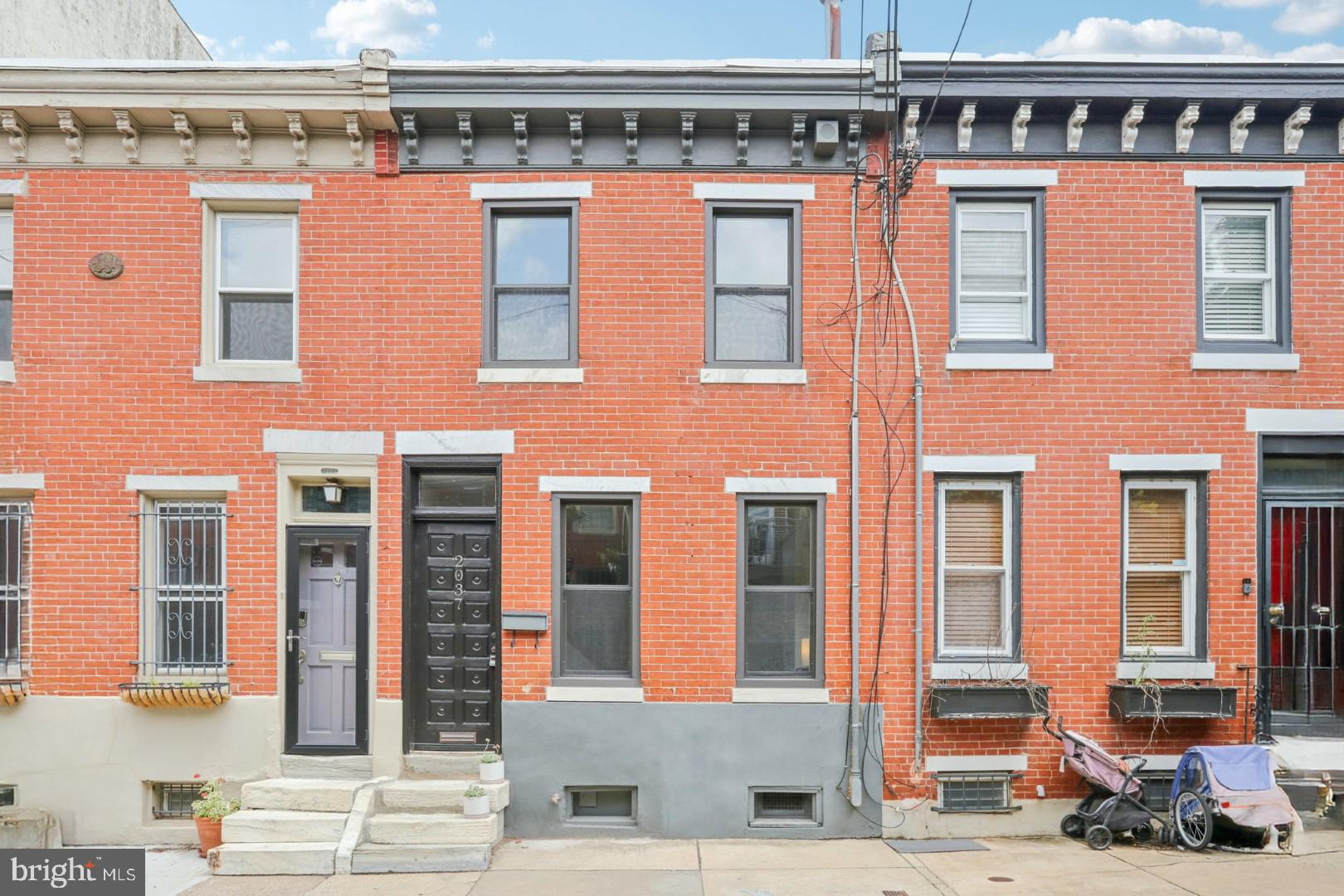 An open and endearing home on a quiet tree-lined block with an A+ location. This home offers the best of all worlds—a loft style, condo alternative, but with a private townhome entrance, two outdoor spaces (including walk-out roof deck), and of course—no condo fees. Plus this south facing home gets excellent light! Enter into the open floor plan living room, dining, and kitchen. Great layout and space. Behind the kitchen is the laundry/storage/mud room, which then leads to a small rear patio. The 2nd floor is one large open bedroom with French doors to a wonderful, private, walk-out Ipe-wood deck. Then stairs ascend to a second level deck with detailed views of the Eastern State Penn towers. A just updated full bath completes the scene. There is also a basement for excellent storage and mechanicals. This special home has an amazing location in the Spring Garden neighborhood. 93 WalkScore and an easy walk to all the restaurants, coffee shops, and shopping of Fairmount Avenue and the art Museum area; Whole Foods, the museums, the River Drives, Center City, and so much more. Excellent home on a lovely, quiet block.