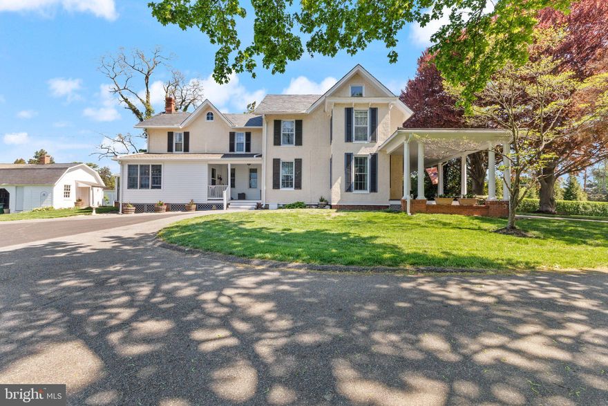 ***PLEASE SUBMIT YOUR HIGHEST AND BEST OFFER WITH NO ESCALATION CLAUSE BY TOMORROW, SUNDAY MAY 4TH  BY 6PM. THANK YOU!***
Rich with history, space, and soul, this 5-bedroom, 2.5-bath farmhouse sits on 4.85 scenic acres in Aberdeen—offering over 4,100 square feet of timeless charm and countryside tranquility. Built in 1900 and surrounded by wide-open pasture, this three-level home blends original character with thoughtful updates in all the right places. A wide, breezy wraparound porch welcomes you with room to slow down, sip your coffee, and take in the peaceful views. Inside, original hardwood floors, crown molding, transom windows, and a gracefully curved staircase speak to the home's enduring craftsmanship. The main level is both welcoming and versatile. A formal living room with built-ins, recessed lighting, and a decorative fireplace sets the tone, while a dedicated home office with stained glass detail provides a quiet, inspiring space. In the dining room, elegant columns and detailed trim frame the room beautifully, with sliding doors leading to a screened-in porch with ceiling fans—perfect for relaxing in any season. The kitchen blends farmhouse charm with everyday function—featuring exposed brick, stainless steel appliances, luxury vinyl plank flooring, a breakfast bar, vaulted breakfast nook, and generous cabinetry. Recessed and pendant lighting warm the space, creating an inviting atmosphere for casual meals or gatherings. Toward the rear of the home, a spacious family room offers brand new carpet, a wood-burning fireplace, recessed lighting, and sliding glass doors on both ends for effortless indoor-outdoor living. A stylish half bath completes the main floor. Upstairs, the vaulted primary suite is a quiet retreat with recessed lighting, a walk-in closet, and a beautifully updated en suite featuring dual vanities, a walk-in shower, and a clawfoot soaking tub wrapped in classic wainscoting. Four additional bedrooms—each with hardwood floors and ceiling fans—offer flexibility, and two include cozy alcoves perfect for reading corners, hobby spaces, or desks. A second full bath with dual sinks and a tub/shower combo serves the upper level. The finished lower level includes a comfortable family room with built-ins, recessed lighting, and a ceiling fan, plus a utility/storage area where parts of the original foundation remain visible—adding to the home’s sense of history and depth. Outside, the land invites you to breathe deeper and dream bigger. A stone patio sits just beyond the screened porch, ideal for hosting or simply enjoying the view. A long asphalt driveway leads to a detached two-car garage and multiple outbuildings, including a large barn with an intact vintage outhouse, a second barn that once served as a horse stable, and additional sheds—ready for storage, creative use, or future possibilities. This one-of-a-kind Aberdeen farmhouse has been lived in with love, cared for with intention, and is now ready for its next chapter. Come experience the warmth, history, and wide-open possibilities of this remarkable property in person—you won’t want to leave.