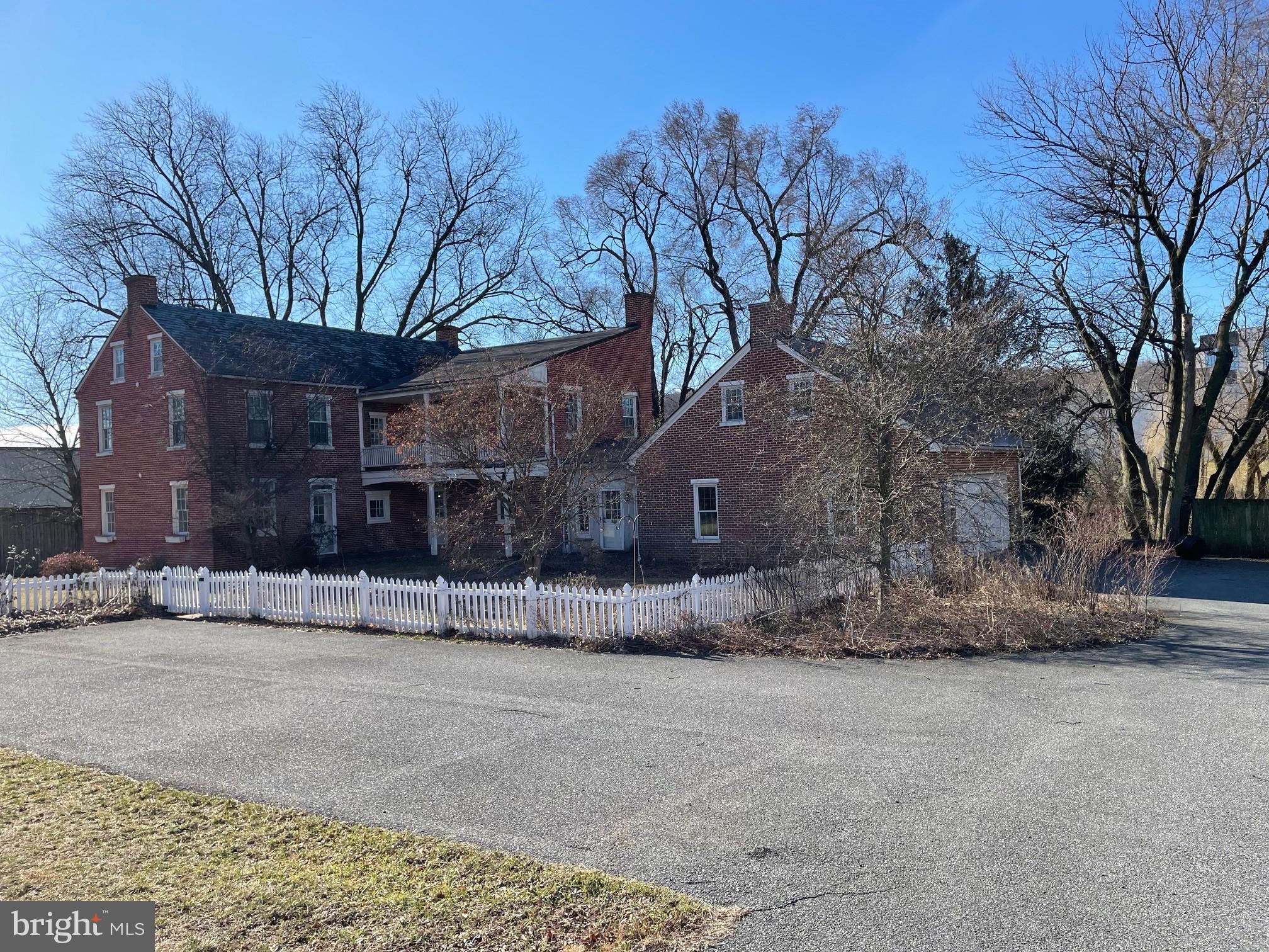 Beautifully restored Farmhouse with aesthetic features seldom found includes 2 car garage and lots of parking/outside storage!
Hardwood floors, exposed brick, duel staircases, elegant kitchen. So close to everything yet tucked away in a cozy environment perfect for nonprofits, insurance, counseling, or any office use that can thrive in a unique setting so close to the Penn State Hospital and newly developed State Rd. corridor.