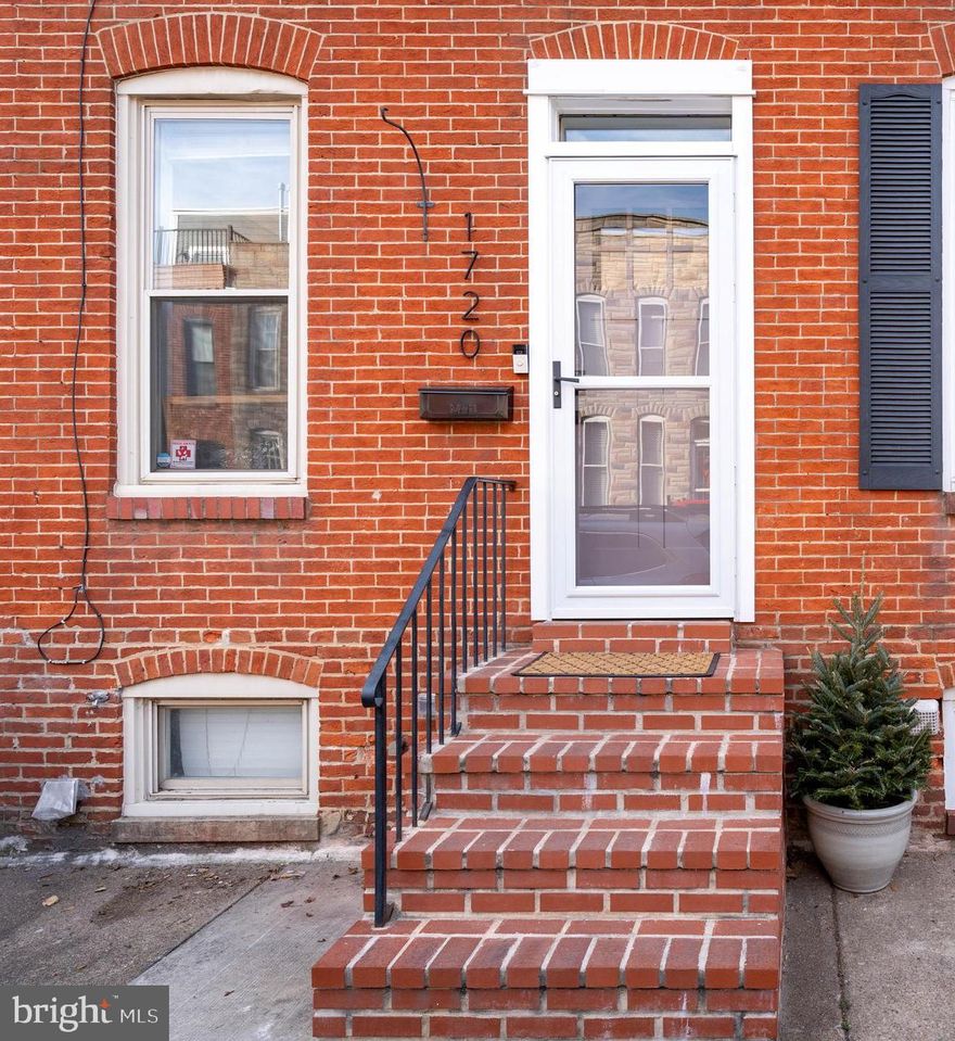 Classic city charm meets thoughtful modern updates at 1720 Byrd St. This refreshed 2-bedroom, 1.5-bath brick townhome is tucked into Federal Hill, just steps from Riverside Park and surrounded by some of the area's best dining and neighborhood favorites. The home features brand-new flooring throughout and beautifully remodeled bathrooms completed within the last two years. The living space is cozy yet stylish, highlighted by a new electric fireplace, custom built-in shelving, and detailed custom trim that adds character and craftsmanship.  The kitchen leads to the back yard--perfect for BBQs or enjoying some urban green space. The back is fully fenced and had low-maintenance turf. Upstairs you'll find two spacious bedrooms, plus a full bath with custom tile and a glass shower door fora  spa-like feel.  The basement offers exceptional storage with a convenient bin wall system, keeping everything organized and out of sight. Easy access to the laundry makes this chore a breeze. With its timeless brick façade, move-in-ready updates, and unbeatable location near parks, restaurants, stadiums, attractions, and waterfront fun, this Federal Hill townhome is the perfect blend of comfort, style, and city living. Don't wait--schedule a visit now!