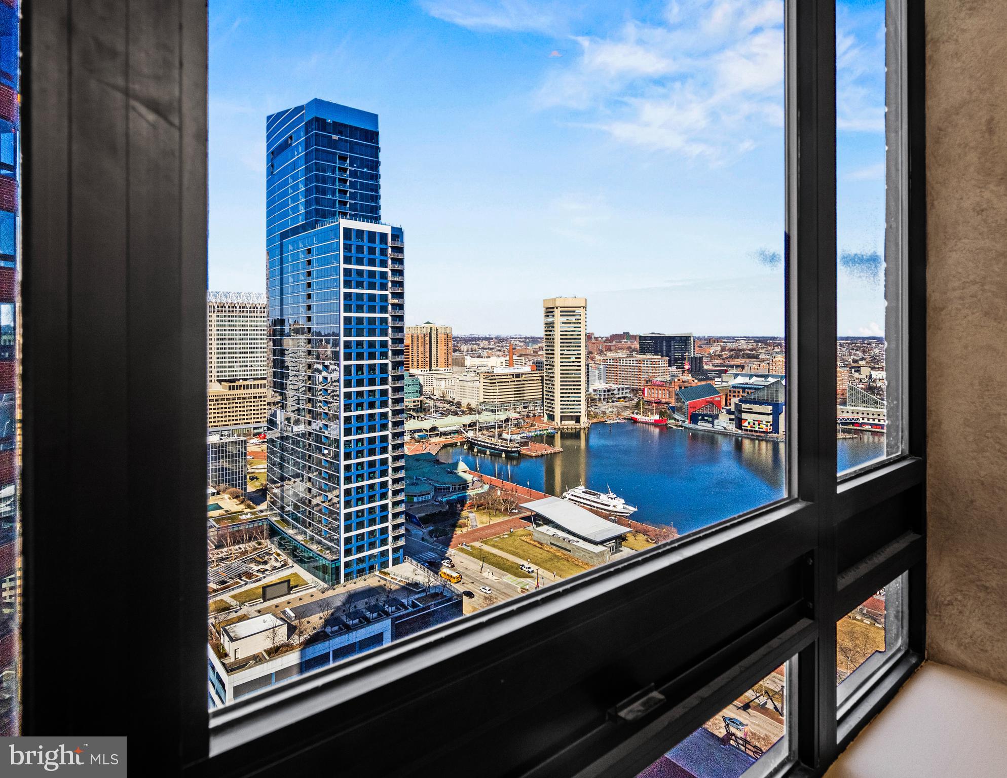 Welcome to the pinnacle of luxury living in this breathtaking residence. Located at 10 East Lee Street, Unit 2405, and nestled in the vibrant heart of Baltimore. This elegant 3-bedroom, 2.5-bathroom (recently upgraded half bath) condo offers 2,108 square feet of living space, with expansive rooms and breathtaking views. Enjoy modern comfort with a brand-new electric hot water heater (installed Dec 2023) and a fully remodeled kitchen designed for both style and functionality. The completely remodeled chef-inspired kitchen boasts top-of-the-line appliances, including a Wolf induction stove, Cove/Wolf dishwasher, GE Café refrigerator, range hood and all beautifully accented by exquisite quartz countertops. In addition, the new LG washer and dryer (installed in September 2023) provide seamless convenience. For enhanced flexibility, there is ample space to accommodate a standard-size freezer or an additional refrigerator, providing unparalleled storage options. This beautifully updated condo showcases updated lighting, new chandelier, stunning new white oak wood flooring and custom built-ins throughout. The additional den offers a flexible space to bring your vision to life, while offering extra storage that enhances both functionality and style.
Unless otherwise noted, the extensive updates and enhancements highlighted earlier have been thoughtfully completed throughout 2023 and 2024, ensuring a move-in-ready home.
This location seamlessly blends modern luxury with urban convenience. Immerse yourself in the open-plan living spaces, flooded with natural light. Savor breathtaking vistas that encompass the iconic Ravens and Orioles stadiums, the historic charm of Federal Hill, and the serene beauty of the Inner Harbor.
The Towers at Harbor Court remains one of Baltimore's most prestigious addresses, offering exceptional service and a wealth of amenities. With 24/7 front desk coverage, a uniformed doorman, porters, security, maintenance staff, secure parking, and additional personal storage, every need is thoughtfully addressed. The prime Inner Harbor location also gives residents access to the services from the adjacent Royal Sonesta Hotel, including concierge assistance, discounts at the fitness center and spa, room and dining discounts, convenient on-site restaurants, a coffee shop, and guest accommodations. Everything you need is right at your doorstep. For those seeking effortless living in a luxurious, amenity-filled environment, The Towers at Harbor Court is a must-see!
Positioned near the Inner Harbor, this residence offers proximity to cultural landmarks, diverse dining, and entertainment venues. With effortless connectivity to Interstates 83 and 95, it offers a lifestyle of refined sophistication and unparalleled convenience.