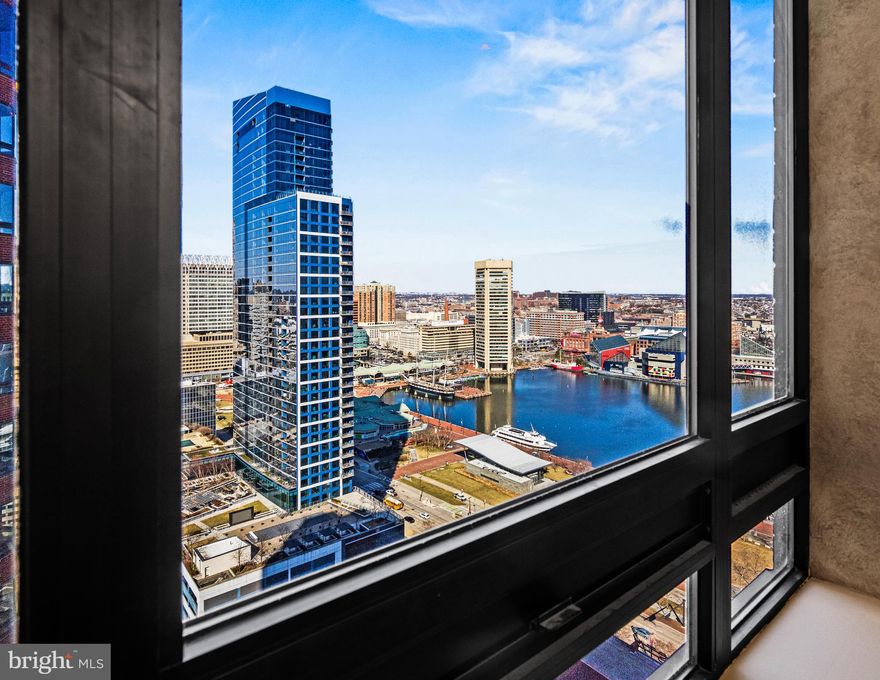 Welcome to the pinnacle of luxury living in this breathtaking residence.  Located at 10 East Lee Street, Unit 2405, and nestled in the vibrant heart of Baltimore. This elegant 3-bedroom, 2.5-bathroom (recently upgraded half bath) condo offers 2,108 square feet of living space, with expansive rooms and breathtaking views.  Enjoy modern comfort with a brand-new electric hot water heater (installed Dec 2023) and a fully remodeled kitchen designed for both style and functionality. The completely remodeled chef-inspired kitchen boasts top-of-the-line appliances, including a Wolf induction stove, Cove/Wolf dishwasher, GE Café refrigerator,  range hood and all beautifully accented by exquisite quartz countertops.  In addition, the new LG washer and dryer (installed in September 2023) provide seamless convenience.  For enhanced flexibility, there is ample space to accommodate a standard-size freezer or an additional refrigerator, providing unparalleled storage options.  This beautifully updated condo showcases updated lighting, new chandelier, stunning new white oak wood flooring and custom built-ins throughout.  The additional den offers a flexible space to bring your vision to life, while offering extra storage that enhances both functionality and style.  
Unless otherwise noted, the extensive updates and enhancements highlighted earlier have been thoughtfully completed throughout 2023 and 2024, ensuring a move-in-ready home.

This location seamlessly blends modern luxury with urban convenience. Immerse yourself in the open-plan living spaces, flooded with natural light.  Savor breathtaking vistas that encompass the iconic Ravens and Orioles stadiums, the historic charm of Federal Hill, and the serene beauty of the Inner Harbor.

The Towers at Harbor Court remains one of Baltimore's most prestigious addresses, offering exceptional service and a wealth of amenities. With 24/7 front desk coverage, a uniformed doorman, porters, security, maintenance staff, secure parking, and additional personal storage, every need is thoughtfully addressed. The prime Inner Harbor location also gives residents access to the services from the adjacent Royal Sonesta Hotel, including concierge assistance, discounts at the fitness center and spa, room and dining discounts, convenient on-site restaurants, a coffee shop, and guest accommodations. Everything you need is right at your doorstep. For those seeking effortless living in a luxurious, amenity-filled environment, The Towers at Harbor Court is a must-see!

Positioned near the Inner Harbor, this residence offers proximity to cultural landmarks, diverse dining, and entertainment venues.  With effortless connectivity to Interstates 83 and 95, it offers a lifestyle of refined sophistication and unparalleled convenience.