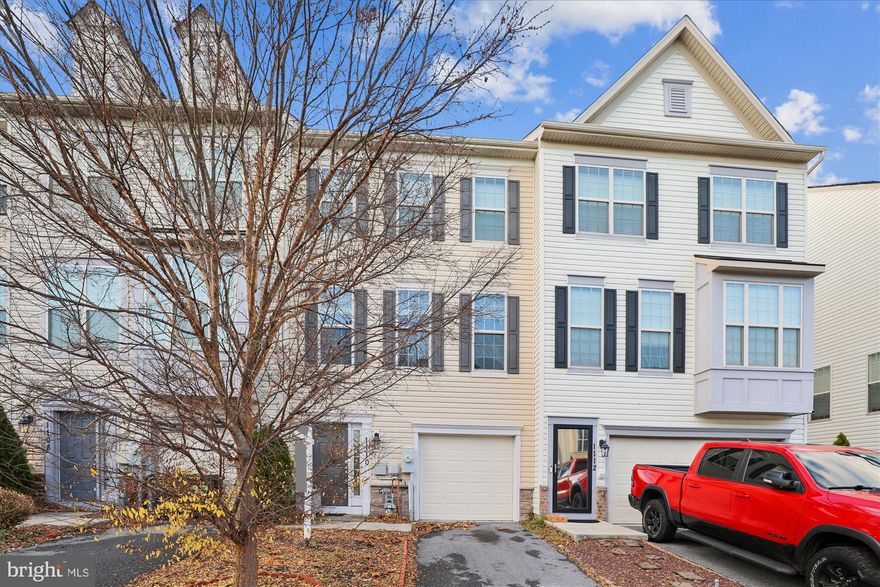 New year. New home! Very impressive 3 level townhome boasting 2200 square ft!. Millstone Village is just minutes to Ft Meade. Each level enjoys an inviting open floor plan. On the main level you will be welcomed with stunning marble tile flooring. This will lead into a spacious family room. The sliding door exits  to a lush back patio. Please note a half bath on this level and entry to the garage as well. Traveling up to the main level you will find another half bath. WOW! Very well laid out floor plan on this level. This is truly the heart of the home. Kitchen offers granite countertops and 42" cabinets. The tasteful color tones of the luxury vinyl compliment the spacious kitchen. Stainless steel appliances all  new in early 2025  Custom shelving added to the pantry. Enjoy a meal on the deck that looks out to woods and nature. The living room has plush carpeting and custom made blinds. Onward to the next level. Here you will find the en suite primary bedroom. Separate shower and double vanities. The remaining 2 bedroom are good sized as well. And all have custom blinds. Brand new Samsung washer and dryer complete this level. Precisely located close to all major routes.  Along with restaurants ,shopping and BWI. Welcome!