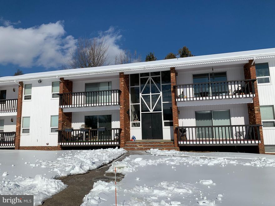 Sunny and spacious two-bedroom, one-bath apartment featuring a galley kitchen with nook for a small table. The open living/dining area extends to a balcony—ideal for relaxing outdoors. The primary bedroom offers a private balcony and large dressing area with built-in vanity. Ample closet/storage space throughout. Bathroom includes separate vanity/commode and shower/tub areas. Conveniently located near Old Town Warrenton, shopping, dining, and commuter routes. Shared coin-operated laundry in basement.  **NO PETS**  *****Photos shown of interior are from a comparable unit in the complex with the same layout. Actual unit may vary in finishes, colors