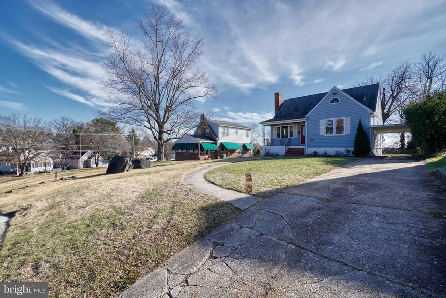 Come tour this updated single family home with 4 bedrooms and 3 full baths. The first floor living area has hardwood floors and features a fireplace, 2 bedrooms and a full bath. Open kitchen and dining areas with granite countertops stainless steel appliances and gas cooking. The upper floor boasts a primary bedroom with an updated full bath. The lower level has another bedroom, full bath and a living/rec room. Enjoy the covered front porch, covered parking and additional parking for visitors. You will love the back deck too. This home has been tastefully updated with vinyl plank flooring in the kitchen and dining areas, new carpet in the basement and stainless steel appliances. Better Hurry!