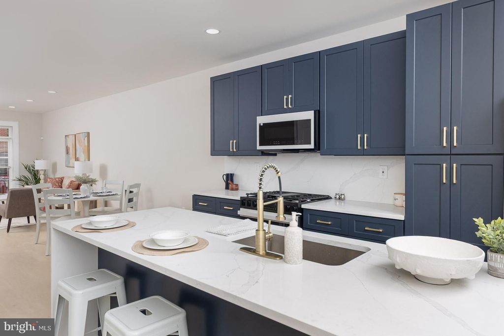 Photo of 117 S Bouldin Street, BALTIMORE, MD 21224 (MLS # MDBA2185498)