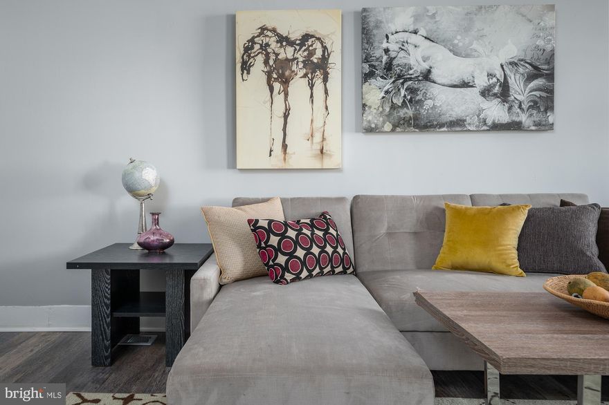 Nicely renovated porch-front home, ready for its new owner. The main level features open and inviting floor plan with a spacious living room, newly installed floors, original french doors and trim, formal dining room, and a newly updated kitchen with white shaker cabinets, stone countertops and stainless steel appliances, as well as a conveniently located powder room and a mudroom. Second floor offers 4 large bedrooms with brand new carpeting and a newly renovated bathroom. Basement is perfect for storage. Front and backyard were newly sodded. Ground rent to be verified by the buyer.