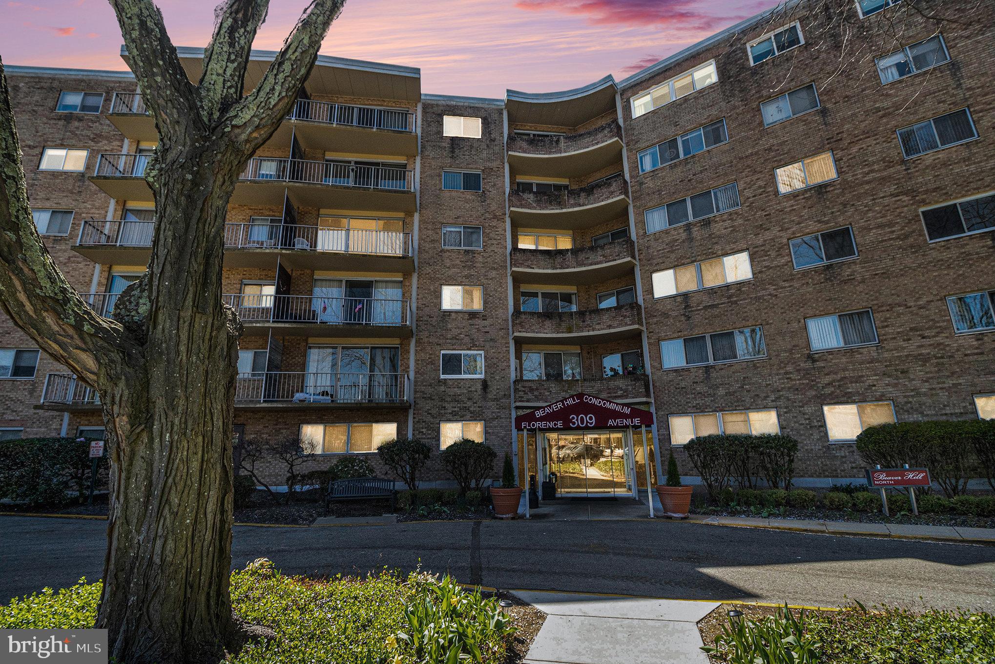 Welcome to this updated 1092 sq foot 2 Bedroom 2 Bath Condo! This inviting unit features a spacious layout with ample hall closet space and a well-appointed kitchen with brand new cabinets and brand new appliance package. The kitchen opens to a combined Dining Room and Living Room which showcases the brand new real hardwood floors. Pass thru the new sliding door and enjoy your balcony view! All new windows throughout as well! Just neutrally painted and professionally cleaned. Convenience is a key feature here, with a laundry and trash room located just down the hallway. The association fee of $890 per month covers heating, cooling, building maintenance, water, sewer, electricity, and more—leaving you to only arrange for cable. A detailed list of included services is available from the condo association. Additional amenities include a storage unit in the basement, and optional garage parking available through a waiting list for $75 per month. Pool access is $120 annually for one person, including two guest passes. The community also offers a rentable Community Room with a kitchen, accommodating up to 60 people for $100, and Guest Rooms at $80 for the first night and $60 for each additional night. Please note, that there is a Capital Contribution fee of $1,780 is due at closing, along with a requirement to pay two months of condo fees upfront. Additionally, a $100 account setup fee, a $50 fob fee, and a $350 non-refundable move-in fee apply. There is a Storage Unit in lower level, Unit 0053. This is a wonderful opportunity to enjoy a well-maintained property with a range of amenities and minimal maintenance. Make an appointment today!