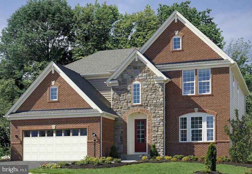 You must see this beauty!!!*The exquisite Rowan model by Drees Homes is a must-see! Previously the model home this property boasts luxurious upgrades and intricate design features throughout. The stately stone and brick exterior, complemented by a slate entryway, creates warm and inviting impression. Upon entering, you are greeted by an open-concept layout with grand two-story foyer an arched decorative niche. Hardwood flooring and elegant arched doorways enhance the main level's sophistication. The formal room, complete a butler’s pantry, leads to chef-inspired gourmet kitchen, a dream for any cook. It features abundant cabinetry, stainless steel appliances, stylish backsplash, an expansive island seating and lighting. The main also includes office. The living room is a centerpiece, highlighted by stone surround and a two-way fireplace. The breakfast room opens onto covered porch overlooking beautifully landscaped yard, with a privacy patio extending from porch and featuring a built-in fire pit for outdoor enjoyment. Covered deck with outdoor fireplace. Your own personal retreat! Dream location for commuters! Upstairs, there are four generously sized bedrooms, including junior suite and a buddy with a double-sink vanity shared by two. The laundry room is equipped with cabinetry and counter space for added convenience The luxurious primary suite serves as a retreat, offering sitting room with built benches and open shelving. The en-suite bathroom upgraded tile, dual sinks a large shower, and soaking tub for relaxation. The basement adds to the home’s appeal, a spacious room with a custom stone wall and built-in. custom bar with a sink and dishwasher is perfect for entertaining. A full bathroom in basement and 2 additional storage spaces used as a gym, hobby area, or office. This remarkable home offers convenient commutes to Quantico and Washington, DC, and is nestled in a sidewalk community high-demand amenity. A must see.