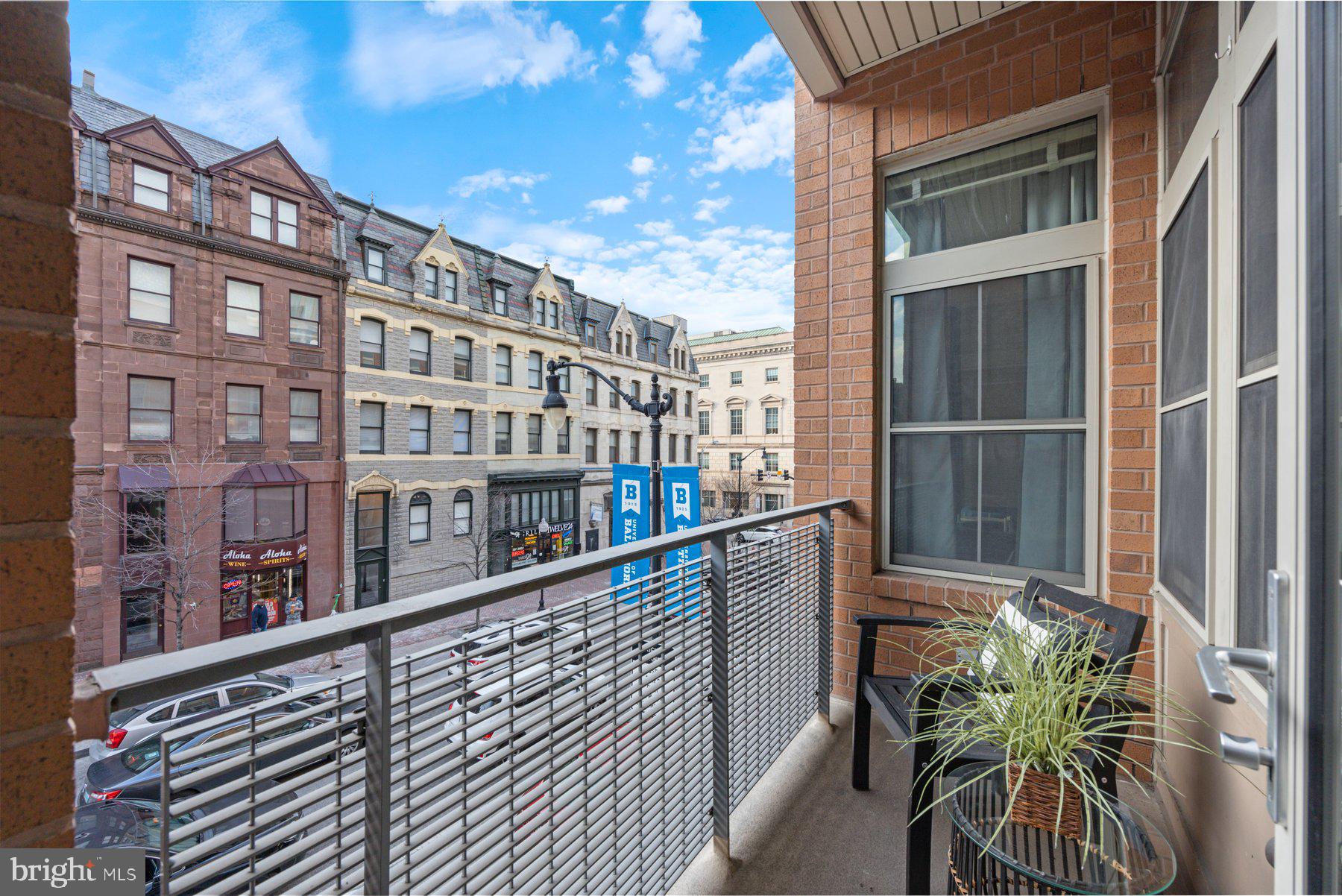 COME SEE THIS CONDO, SUNDAY 4/13 FROM 12-2. Welcome to this 2-bedroom, 2-bathroom condo in the heart of Baltimore City. This condo features hardwood floors throughout the living space and plush carpeting in the bedrooms. The kitchen has granite countertops and stainless steel appliances, perfect for your culinary endeavors. Cabinet space will not be a concern as there is ample space. Just off of the kitchen is a closeted wash room with a washer and dryer (both 2024). The living room and dining space seamlessly blend together and are highlighted by the grand 10ft ceilings and large windows which amplifies the space. Just off of the living room is the balcony with space for seating. The balcony overlooks N. Charles St, a bustling yet quiet street. Perfect for people watching while also maintaining your own privacy.
Monthly electric bill is $70, gas is included in condo fees.
The primary bedroom is grounded plush carpeting and is expanded by the 10ft ceilings. There is an expansive walk-in closet to suit all your storage needs. The primary bathroom features a dual sink, a walk-in shower, and plenty of storage space. The 2nd bedroom and full bathroom gives guests plenty of space and privacy to feel comfortable.
The condo’s building has everything you could need. Parking will never be a problem as you have an assigned parking space just by the door to enter the building. There is no need to take pets out in the city late at night as there is a pet park just 2 levels up. The puppy park also features an outdoor lounge and social space with a fireplace. The building also has a gym with a peloton bike that is open 24/7 for your convenience. In the lobby, the building has Amazon lockers and a secure mail room so you never have to worry about package theft.
Don’t miss out on this incredible opportunity in Baltimore. You are just steps away from Baltimore’s most popular locations such as the BSO, Penn Station, The Brewer’s Art, Charles Theatre, UB Law School, MICA, and so much more. Oh, and did I mention that Starbucks is right downstairs?! Schedule your showing today!