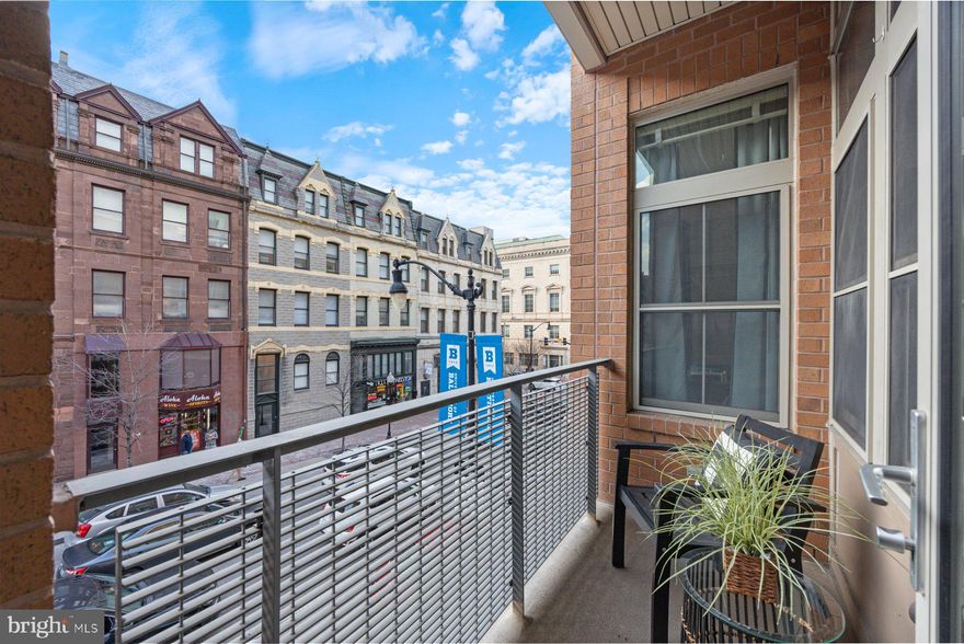 COME SEE THIS CONDO, SUNDAY 4/13 FROM 12-2.  Welcome to this 2-bedroom, 2-bathroom condo in the heart of Baltimore City. This condo features hardwood floors throughout the living space and plush carpeting in the bedrooms. The kitchen has granite countertops and stainless steel appliances, perfect for your culinary endeavors. Cabinet space will not be a concern as there is ample space. Just off of the kitchen is a closeted wash room with a washer and dryer (both 2024). The living room and dining space seamlessly blend together and are highlighted by the grand 10ft ceilings and large windows which amplifies the space. Just off of the living room is the balcony with space for seating. The balcony overlooks N. Charles St, a bustling yet quiet street. Perfect for people watching while also maintaining your own privacy. 
Monthly electric bill is $70, gas is included in condo fees.
The primary bedroom is grounded plush carpeting and is expanded by the 10ft ceilings. There is an expansive walk-in closet to suit all your storage needs. The primary bathroom features a dual sink, a walk-in shower, and plenty of storage space. The 2nd bedroom and full bathroom gives guests plenty of space and privacy to feel comfortable. 

The condo’s building has everything you could need. Parking will never be a problem as you have an assigned parking space just by the door to enter the building. There is no need to take pets out in the city late at night as there is a pet park just 2 levels up. The puppy park also features an outdoor lounge and social space with a fireplace. The building also has a gym with a peloton bike that is open 24/7 for your convenience. In the lobby, the building has Amazon lockers and a secure mail room so you never have to worry about package theft.

Don’t miss out on this incredible opportunity in Baltimore. You are just steps away from Baltimore’s most popular locations such as the BSO, Penn Station, The Brewer’s Art, Charles Theatre, UB Law School, MICA, and so much more. Oh, and did I mention that Starbucks is right downstairs?! Schedule your showing today!