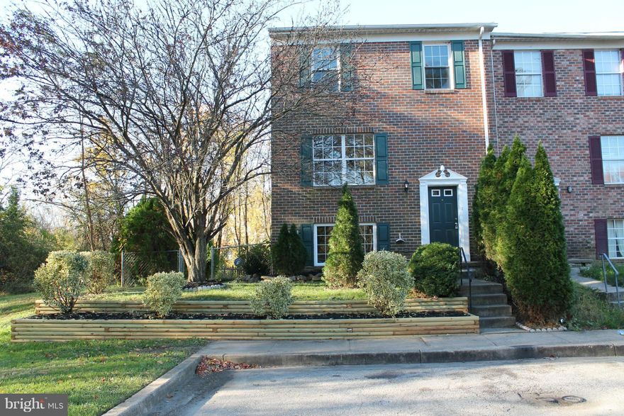 Recently renovated, end of group townhouse! Private side yard with new deck boards. New carpet. Professionally painted.  Full bath on lower level! Large rec room with sliders to yard. Spacious & bright Living Room with hardwood floors. Huge Master Bedroom with walk-in closet and access to dual-entry bath. Move in ready!