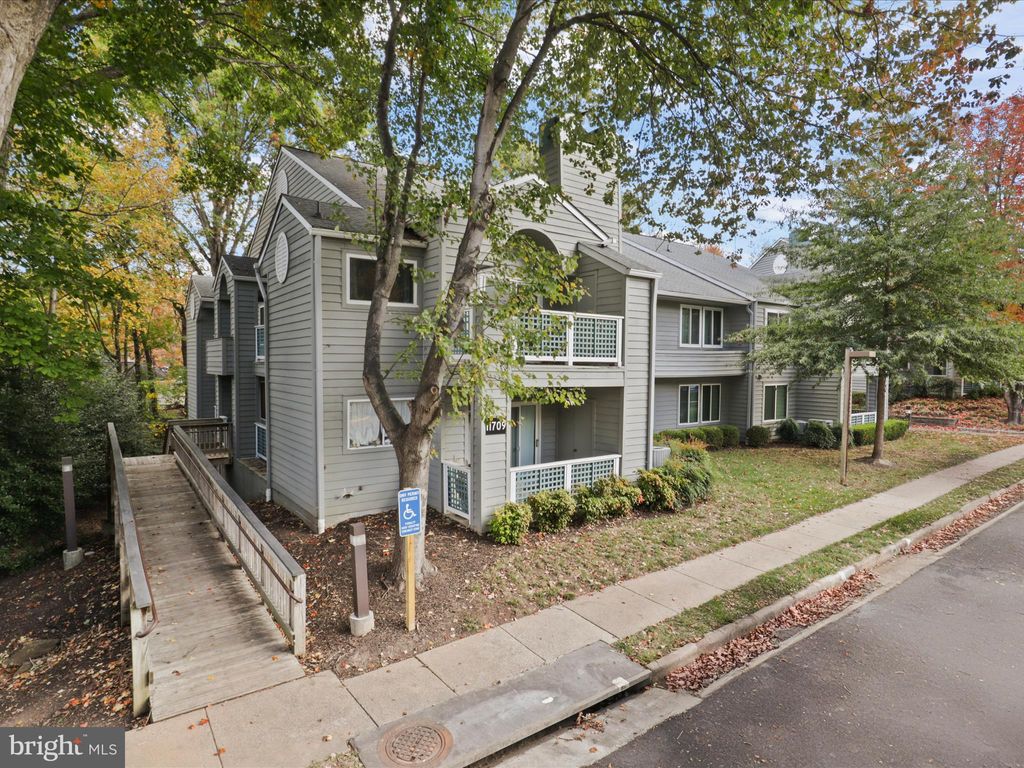 Photo of 11709 Summerchase Circle #D, RESTON, VA 20194 (MLS # VAFX2276010)