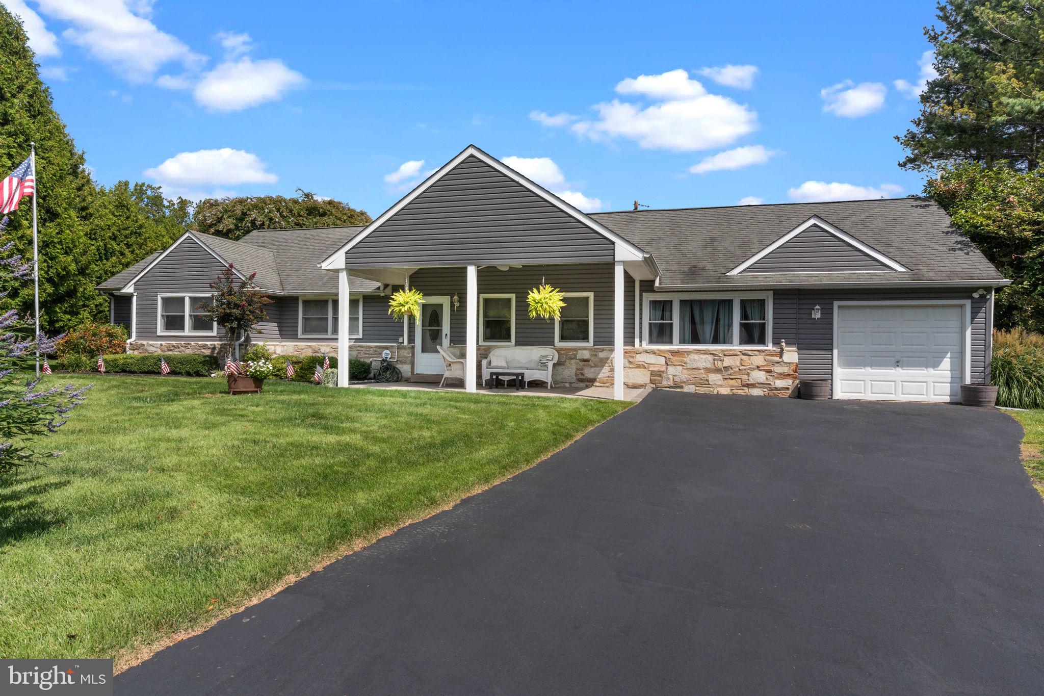 Welcome to this beautifully maintained ranch-style home, in desirable Rydal. It is set on a corner lot of just over one-third acre, surrounded by lush landscaping, a built-in irrigation system, and plenty of space to enjoy both inside and out.
A charming front porch sets the tone as you step into the inviting living room, complete with a coat closet and ceiling fan. The heart of the home is the expansive kitchen addition, where soaring vaulted ceilings, skylights, and recessed lighting fill the space with natural light. Designed for both everyday living and entertaining, the kitchen features granite countertops, abundant cabinetry, a center island with seating, built-in microwave, refrigerator, dishwasher, and a spacious dining area with sliding doors that open to the backyard.
The floor plan flows into a step-down family/den area with a large closet, included TV, and direct access to a flexible room that can serve as a home office or 4th bedroom.
The primary suite is a private retreat, offering a spacious bedroom with ceiling fan and closet, and a luxurious bath addition with a corner jetted tub, tile stall shower, and oversized vanity. Two additional bedrooms, a hall bath, and a convenient powder room provide comfort for family and guests.
Outdoors, you’ll love the large front lawn, two rear patios perfect for entertaining, shed for storage, and plenty of parking with a one-car garage and generous driveway. The home also features Pella windows, a security system, and thoughtful updates throughout.
This is a home that truly balances comfort, function, and style—move-in ready and waiting for its next chapter.