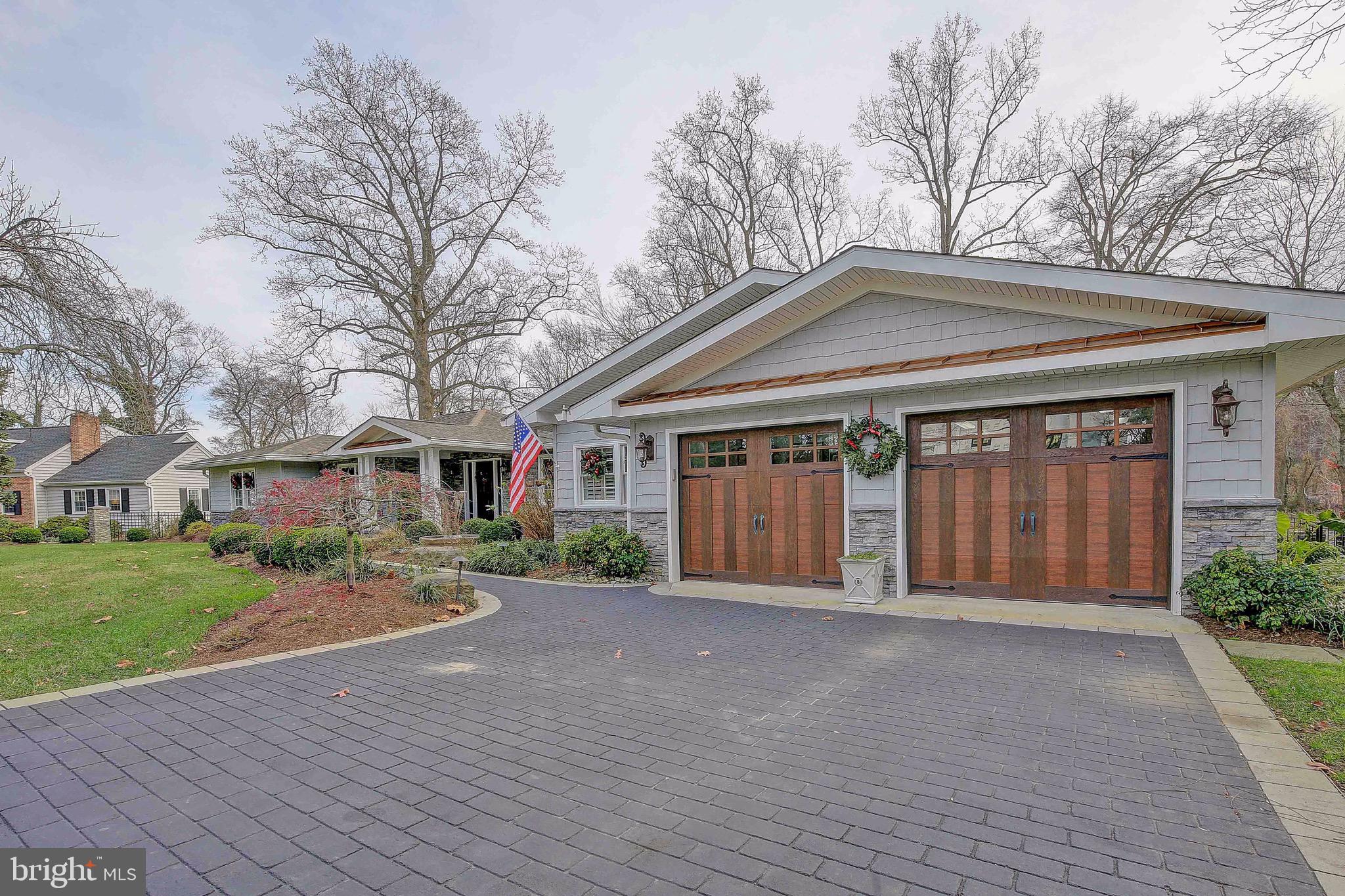 Spectacular 3/4 acre waterfront home that has been upgraded in every area to include and amazing kitchen with two dishwashers, separate prep sink. Basement with wine cellar, work shop, large game/entertainment room, walk in safe, and hidden security space. All bathrooms and kitchen have heated floors. Master bath with steam shower. Built in bunk beds and Murphy bed. Garage can house four cars, has plenty of storage and a commercial oil resistant floor. At the dock is a 20,000 lb boat lift with one 50 amp and 3 , 30 amp outlets. Easy access to Annapolis Harbor, the Bay, and Baltimore. Large deck with hot tub. When the new roof was put on in 2012 new 1/2 inch plywood was put under the shingles so very well insulated. New gutter helmet installed last year. Duct work all cleaned and UV light added to AC to kill any bacteria. This home has all the bells and whistles and is a must see! Almost all furniture is negotiable .