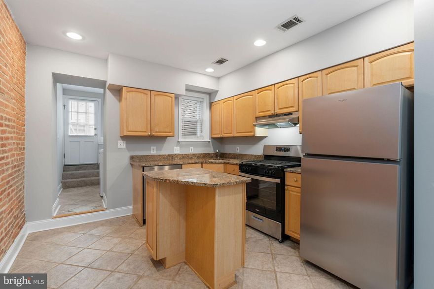 Ideally located in the heart of Canton, this charming rowhouse is just steps from the Canton Merritt Athletic Club and offers a perfect blend of comfort, convenience, and valuable updates. The home features two spacious bedrooms, both located on the second floor, along with two full bathrooms, including one on the second floor and another in the fully finished basement. Recent improvements include a new roof with warranty, a new rooftop deck perfect for outdoor entertaining or relaxing, and an updated kitchen with new stainless steel kitchen appliances. The house has all new carpet on the second floor and Lower Level and has been completely painted.  The first floor has engineered wood floors in the living/dining area and Tile in the kitchen.  Laundry is conveniently located on the first floor.  A private parking pad adds everyday convenience, and warranties on all appliances and systems provide added peace of mind.