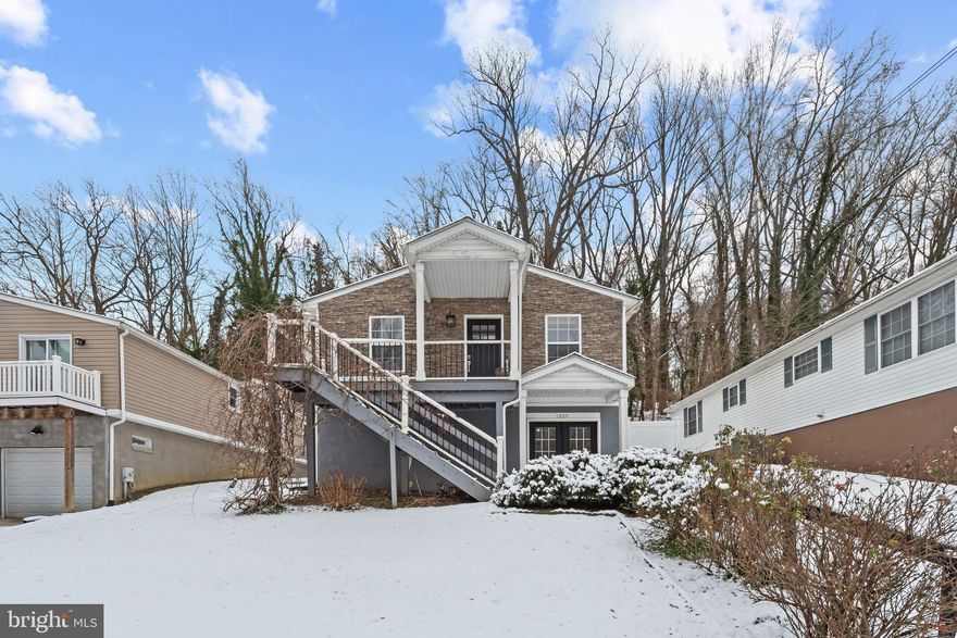 Location, location, location! Welcome to 1927 Kelly Avenue, a beautifully updated home offering modern comfort in the heart of Mount Washington. Renovated prior to the current ownership, this home features a chef’s kitchen with stainless steel appliances, granite countertops, and a breakfast bar that opens to a sun-filled, open floor plan with gleaming hardwood floors—perfect for everyday living and entertaining. The spacious primary suite includes an ensuite bath with deluxe tile, while a large storage and laundry room adds exceptional functionality. Enjoy a fully fenced yard ideal for outdoor gatherings, plus the convenience of off-street parking. Thoughtful upgrades include a cozy fireplace, newly purchased washer and dryer, dimmer switches, custom window treatments, and added towel hooks throughout. Beyond the home itself, the lifestyle is truly unmatched. With direct access to the Jones Falls Trail and a charming arboretum just minutes away, nature is right outside your door. This sought-after neighborhood is known for its walkability, shops, and a beloved Sunday farmers market in the local park. The home was chosen by the previous owners for its rare combination of classic wood floors, an open layout, abundant storage, and the charm of a historic neighborhood—without the maintenance concerns of an older home—thanks to its newer construction and fresh renovation. This is Mount Washington living at its best.