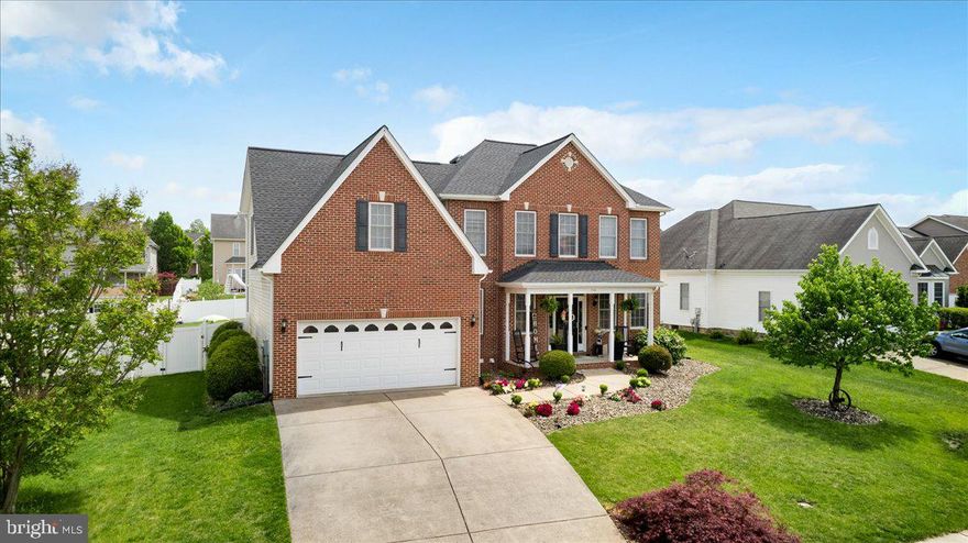 *The Darby Dream*  You won't want to miss your chance to come see this gem.  In the highly desired neighborhood of Raven Wing sits this well maintained dream home.  The interior includes three fully finished floors that include a bedroom on the main level, a flex room for a home office or home library, an upstairs loft area, the primary bedroom and MASSIVE walk-in closet will be a dream come true after you shop til you drop.  The basement includes a full kitchen, full bathroom, and second Laundry room.  If you're still looking for more features, head out back to the large fully fenced yard.  Take a seat on the covered porch that's equipped with ceiling fans and a drop down outdoor TV.  Are you ready for a nice cozy night sitting by the outdoor chimney fire?  Many upgrades and improvements have been made recently such as, replaced roof in 2023, chair rails and wainscoting throughout, tankless water heater, vinyl fence added, basement kitchen, bathroom, and laundry added.  Don't miss the opportunity to make your dream come true.