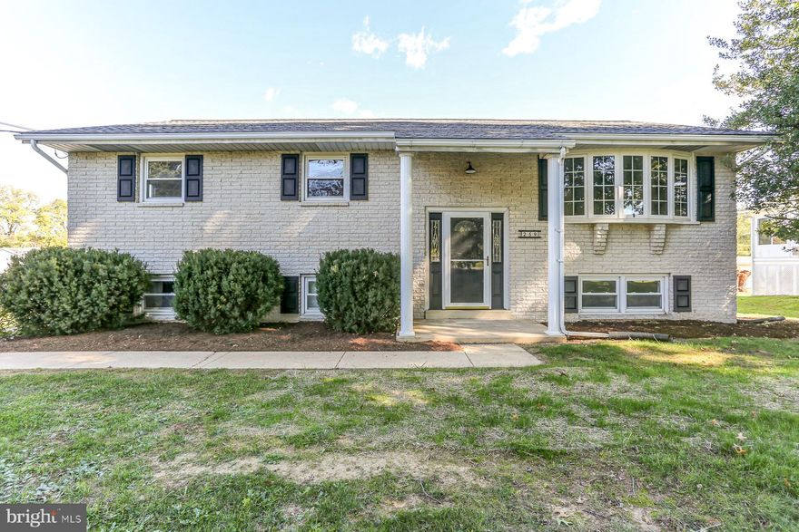 Check out this beauty in Bainbridge! This home has been beautifully remodeled and is ready for the next owner to move right in. This home boasts a brand new kitchen with white shaker soft-close cabinets, quartz countertops and brand new appliances. There's plenty of space in the kitchen for preparing meals and seating at the island with the open floor plan. There is fresh paint and new flooring throughout as well as designer fixtures, recessed lighting in the living room and many other upgrades throughout! The main bathroom has been updated with a brand new tub/surround as well as recent vanity and flooring. The lower level offers even more space with a family room and full bathroom/laundry. There's space for all your projects with the large 2 car garage as well! Other big $$ improvements have been made as well, including a brand new roof, centeral heat/ac pump, and brand new deck overlooking the large flat backyard. This home is one of the few homes in Bainbridge that backs up right to Conoy Creek Park!